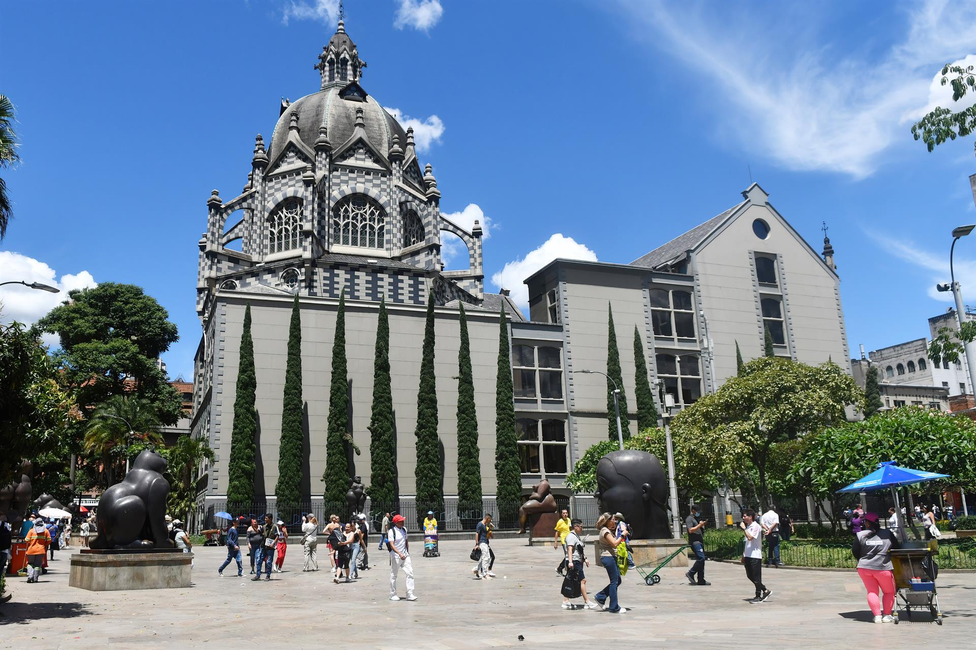 Visitors on Botero Square, July 9, 2022 in Medellin, Colombia. EFE/Luis Benavides
