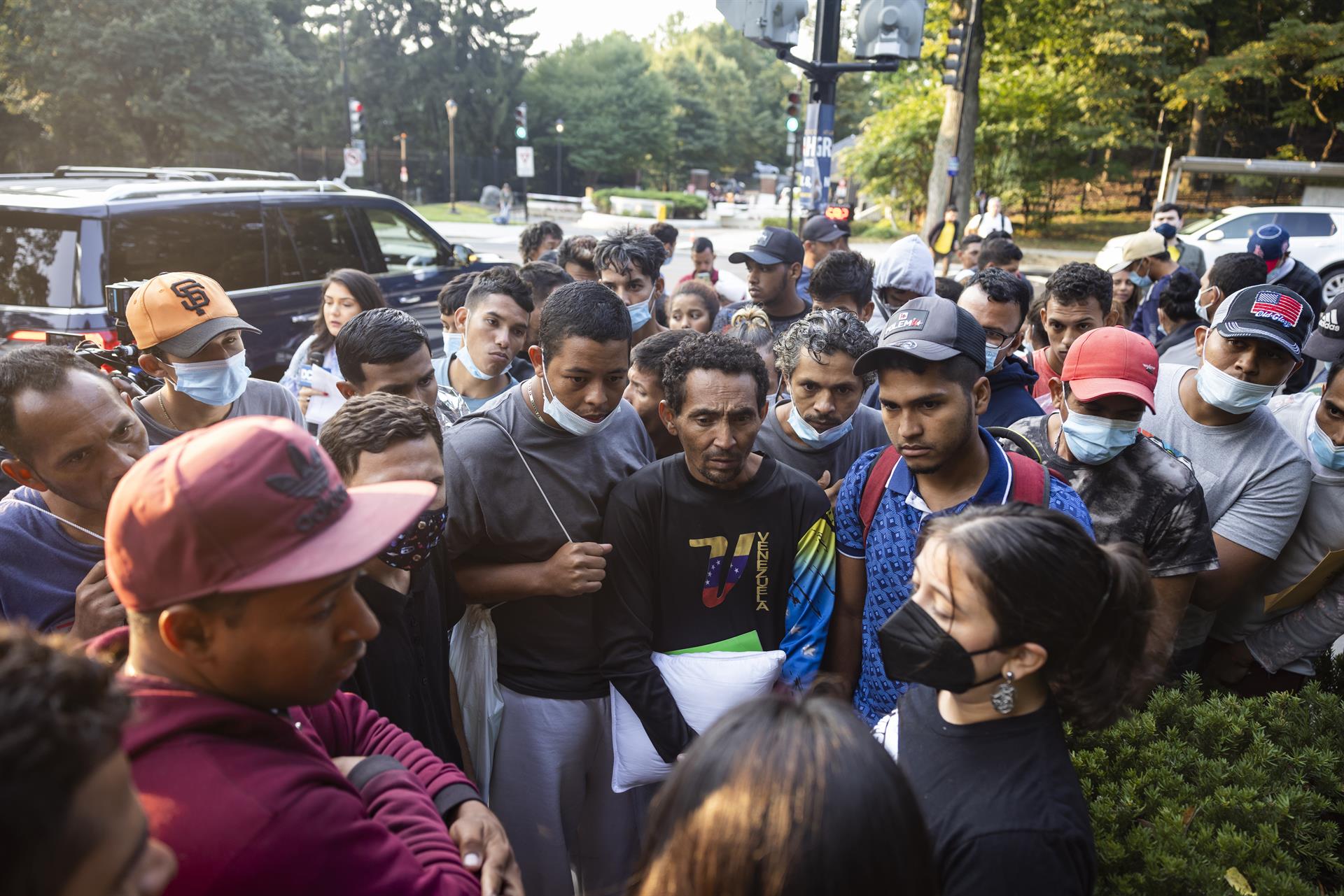 Two bus-loads of migrants from Central and South America arrive outside Vice President Kamala Harris’s residence at the Naval Observatory early in the morning in Washington, DC, USA, 15 September 2022. EPA-EFE/JIM LO SCALZO
