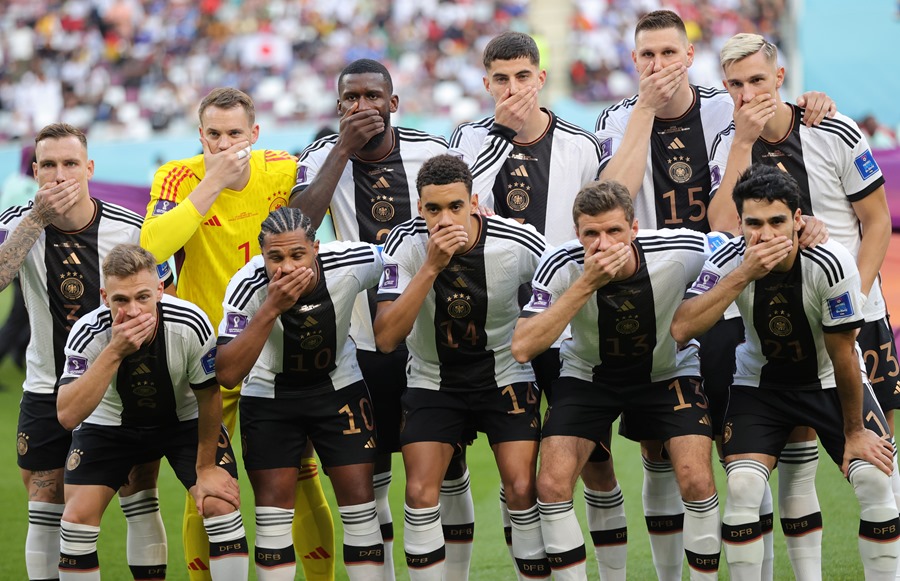 Germany national team covering their mouths