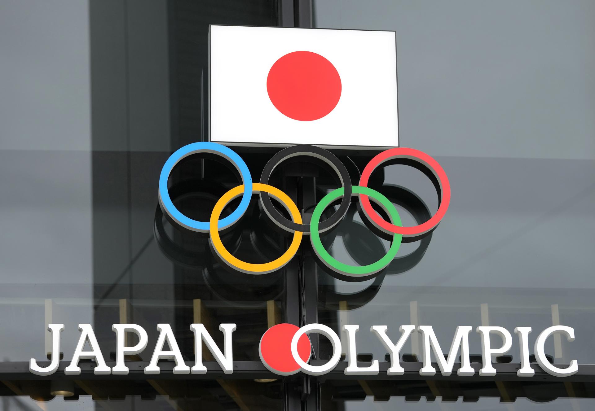 The emblem at Japan Sport Olympic Square is displayed on the wall of the building near the National Stadium in Tokyo, Japan, 29 November 2022. EFE-EPA FILE/KIMIMASA MAYAMA