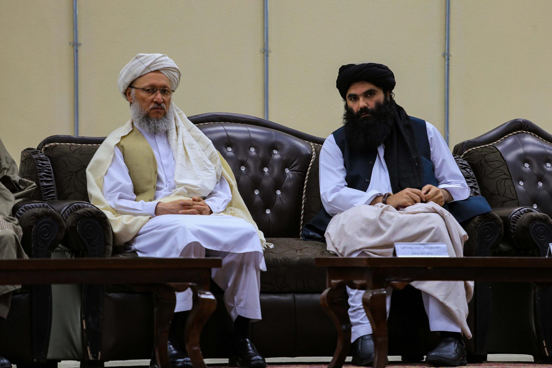 Afghan second deputy Prime Minister Mullah Abdul Salam Hanafi (L), and Interior Minister of Afghanistan Sirajuddin Haqqani (R) look on during a ceremony in Kabul, Afghanistan, 03 April 2022. EFE-EPA FILE/STRINGER