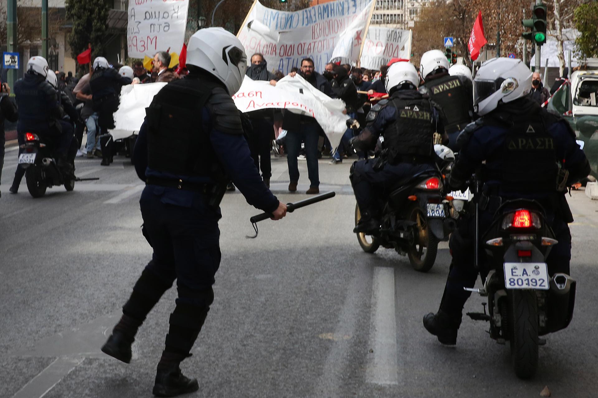 Riot policemen on motorcycles try to disperse demonstrators during clashes after the end of a rally in honor of the 57 victims of Greece's deadliest train crash, in central Athens, Greece, 05 March 2023. EFE/EPA/ORESTIS PANAGIOTOU