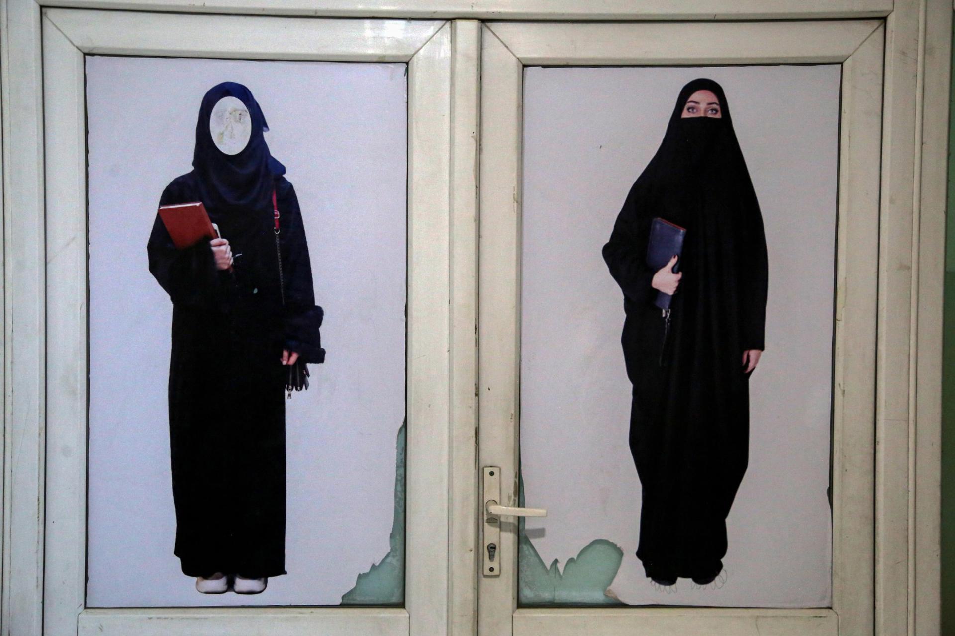 An illustration on dress code for female students is seen at private Rana university as universities session reopened after holidays, in Kabul, Afghanistan, 07 March 2023. EFE/EPA/SAMIULLAH POPAL