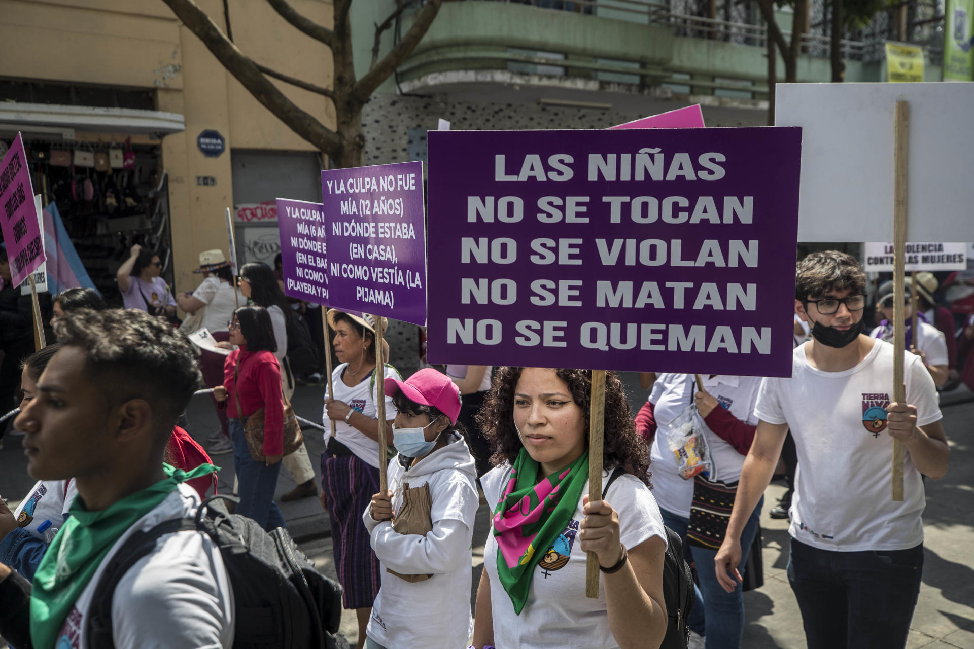 Members of feminist organizations march on March 8, 2023, in Guatemala City to demand justice in the case of a fire that killed 41 girls in 2017 at a state-run home. EFE/ Esteban Biba
