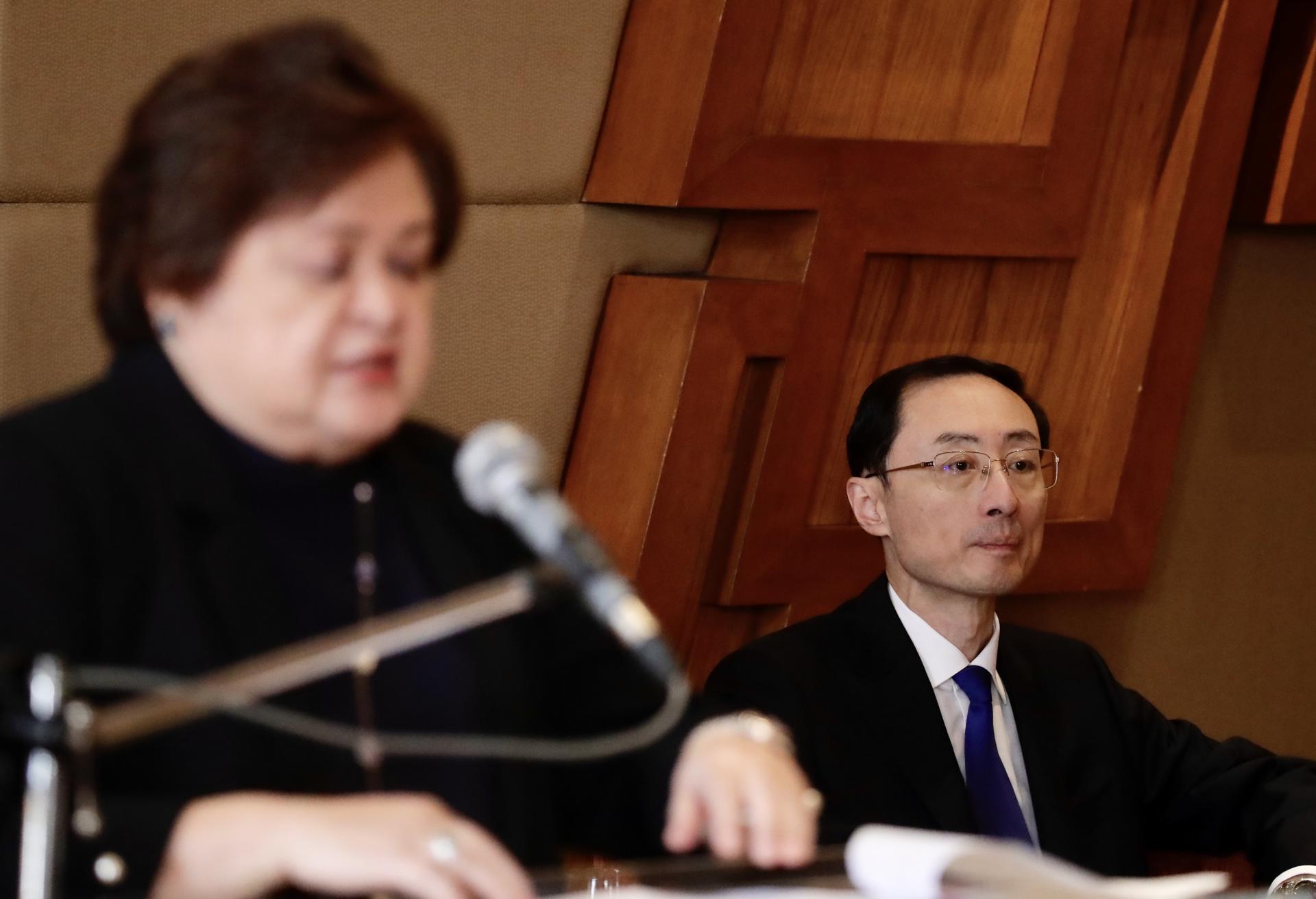 Filipino Foreign Affairs Undersecretary Maria Lourdes Lazaro (L) speaks while Chinese Vice Foreign Minister Sun Weidong (R) listens during a bilateral meeting in Manila, Philippines, 24 March 2023. EFE/EPA/FRANCIS R. MALASIG / POOL