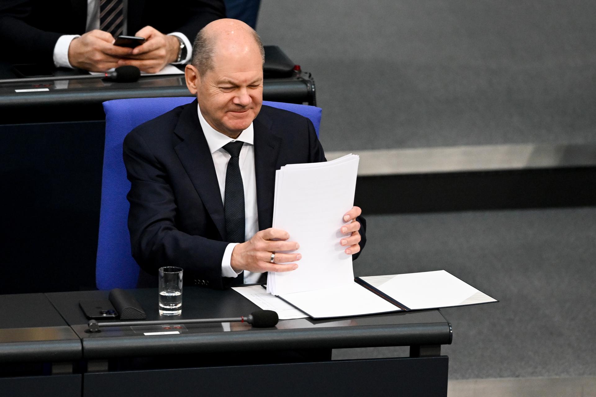 German Chancellor Olaf Scholz after delivering his statement 'A Year of Changing Times - Strengthening Germany's Security and Alliances, Continuing to Support Ukraine' at the German parliament Bundestag in Berlin, Germany, 02 March 2023. EFE/EPA/FILIP SINGER