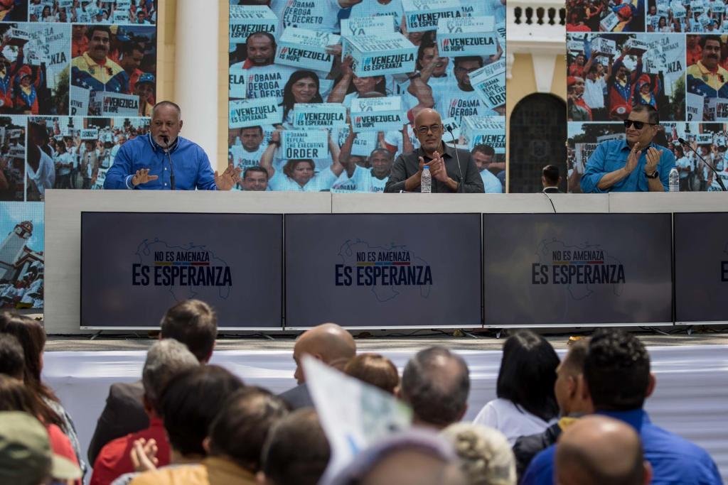 Deputy Diosdado Cabello (i), the president of the National Assembly, Jorge Rodriguez (c) and the former president of Ecuador, Rafael Correa (d), participate in an act for the "Bolivarian Anti-imperialism Day" today, in Caracas (Venezuela).  EFE/Miguel Gutierrez