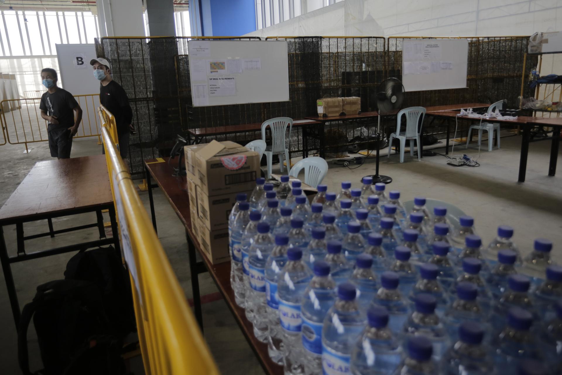 Bottles of water on a table at a swab isolation facility in the JTC Space·Tuas building in Singapore, 10 May 2020. EFE/EPA/FILE/WALLACE WOON