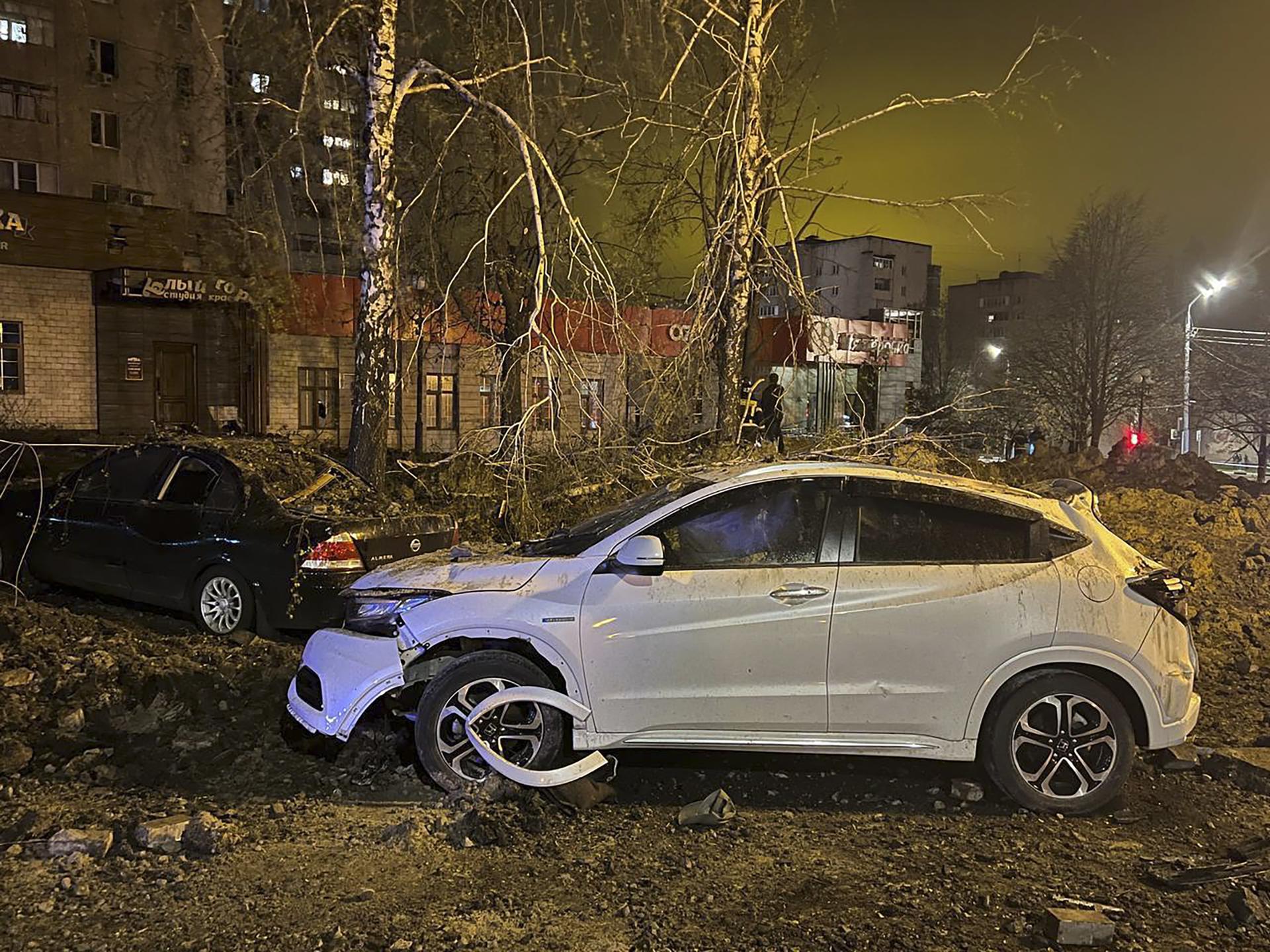 A handout photo made available by the Governor of the Belgorod Region Vyacheslav Gladkov's telegram channel shows damaged cars near the blast crater in downtown Belgorod, Russia, 20 April 2023. EFE/EPA/BELGOROD GOVERNOR VYACHESLAV GLADCOV TELEGRAM CHANNEL/HANDOUT HANDOUT EDITORIAL USE ONLY/NO SALES