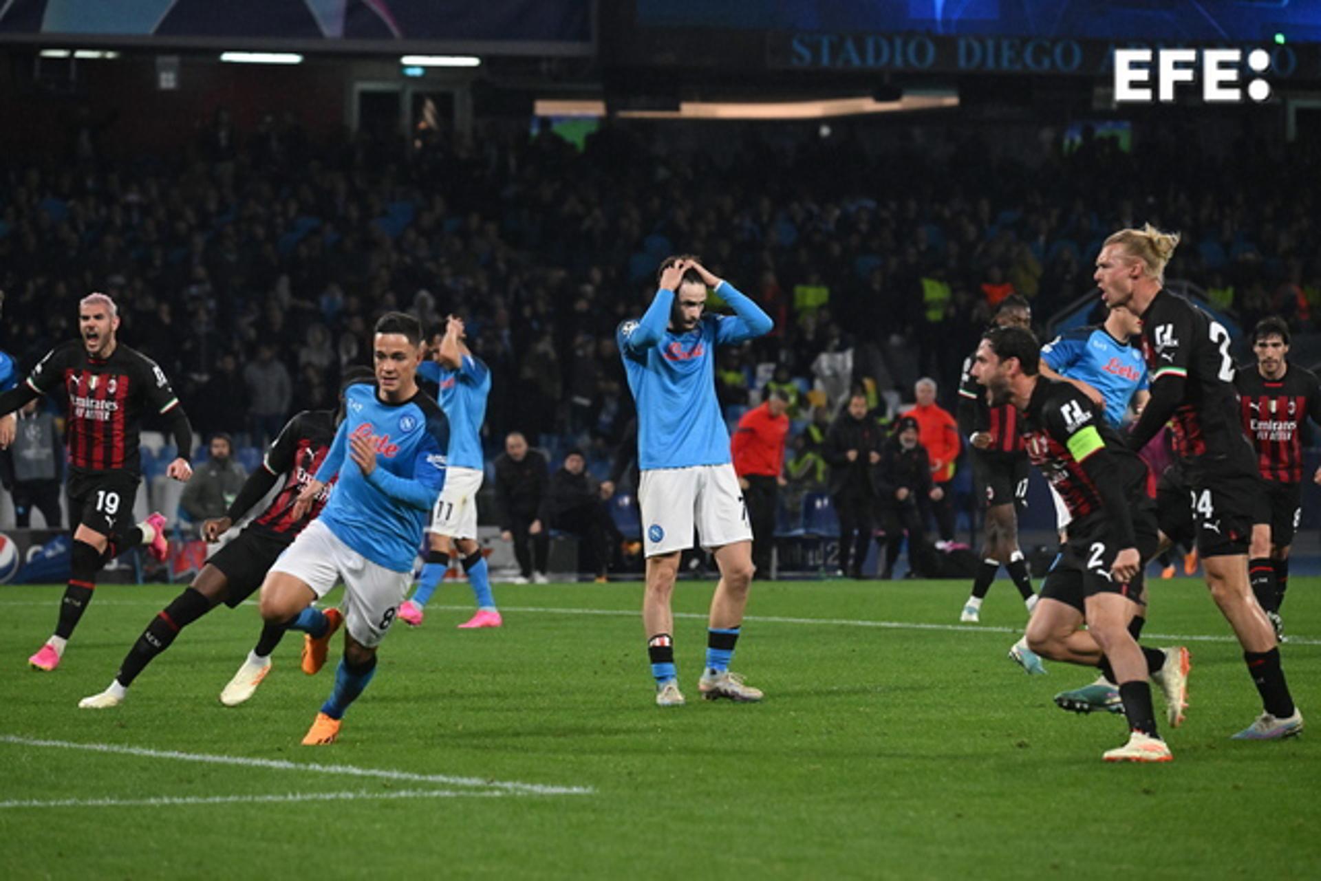 Napoli's Khvicha Kvaratskhelia reacts after AC Milan goalkeeper Mike Maignan stopped his penalty shot during the UEFA Champions League quarterfinal second leg in Naples, Italy, on 18 April 2023. EFE/EPA/CIRO FUSCO
