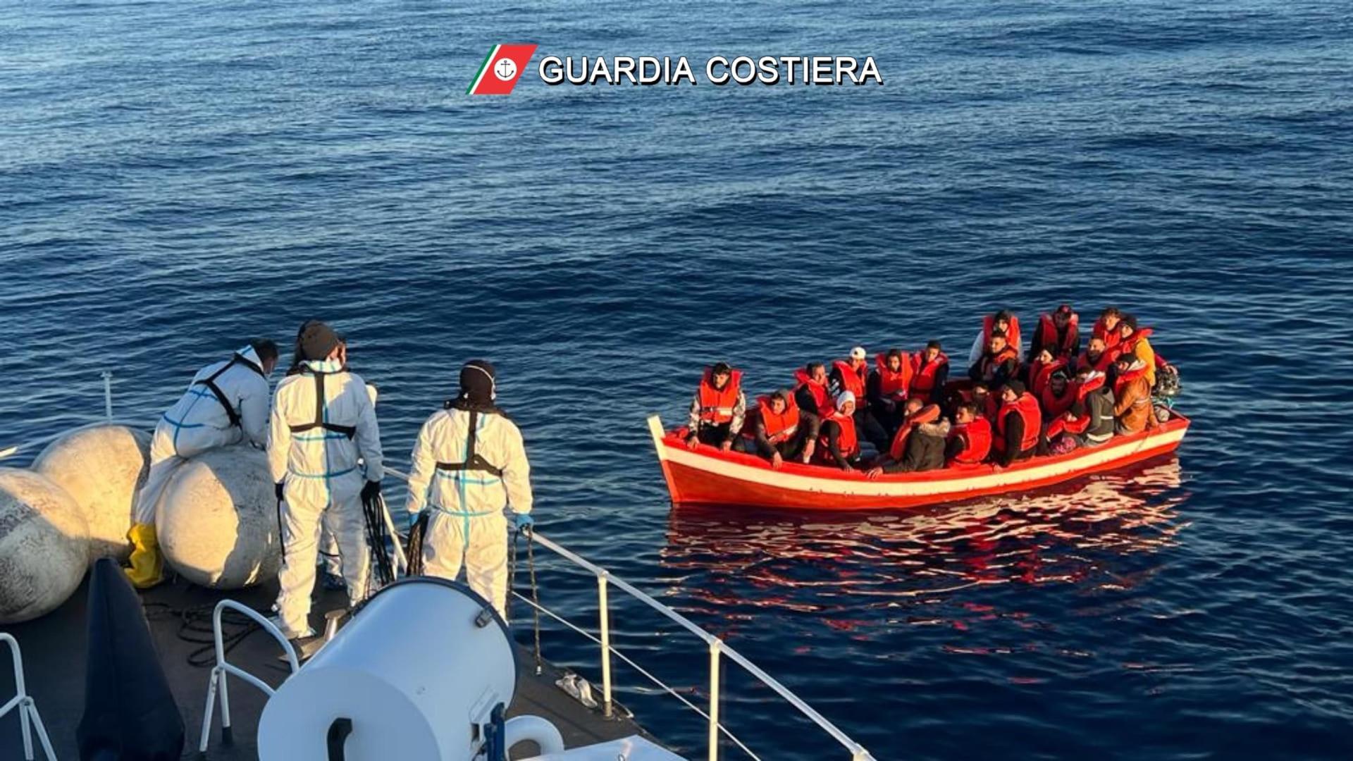 A handout photo made available by Italian Coast Guard (Guardia Costiera) shows Italian Coast Guard rescuing migrants in Ionian Sea of the Mediterranean, close to Sicily and Calabria, Italy, 10 April 2023. EFE/EPA/ITALIAN COAST GUARD