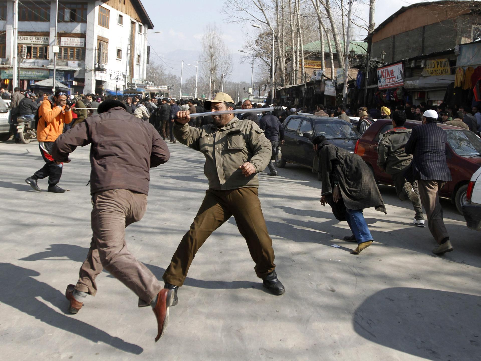 Indian police charge demonstraters during a protest against the newly approved Drug Policy in Srinagar, the summer capital of Indian Kashmir, 09 February 2012. EPA/FILE/FAROOQ KHAN