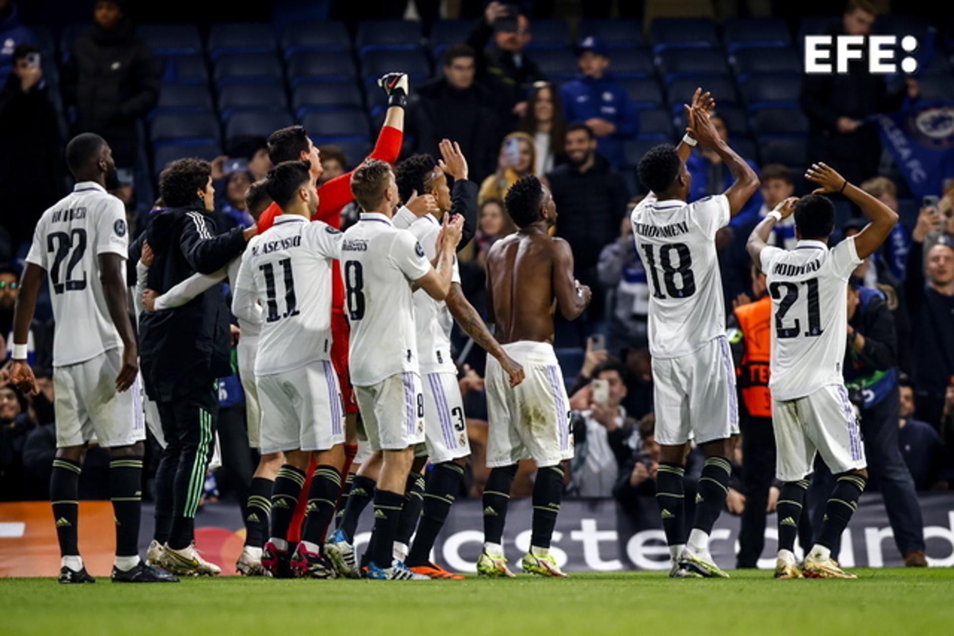 Real Madrid players celebrate after defeating Chelsea in the UEFA Champions League quarterfinal in London on 18 April 2023. EFE/EPA/TOLGA AKMEN
