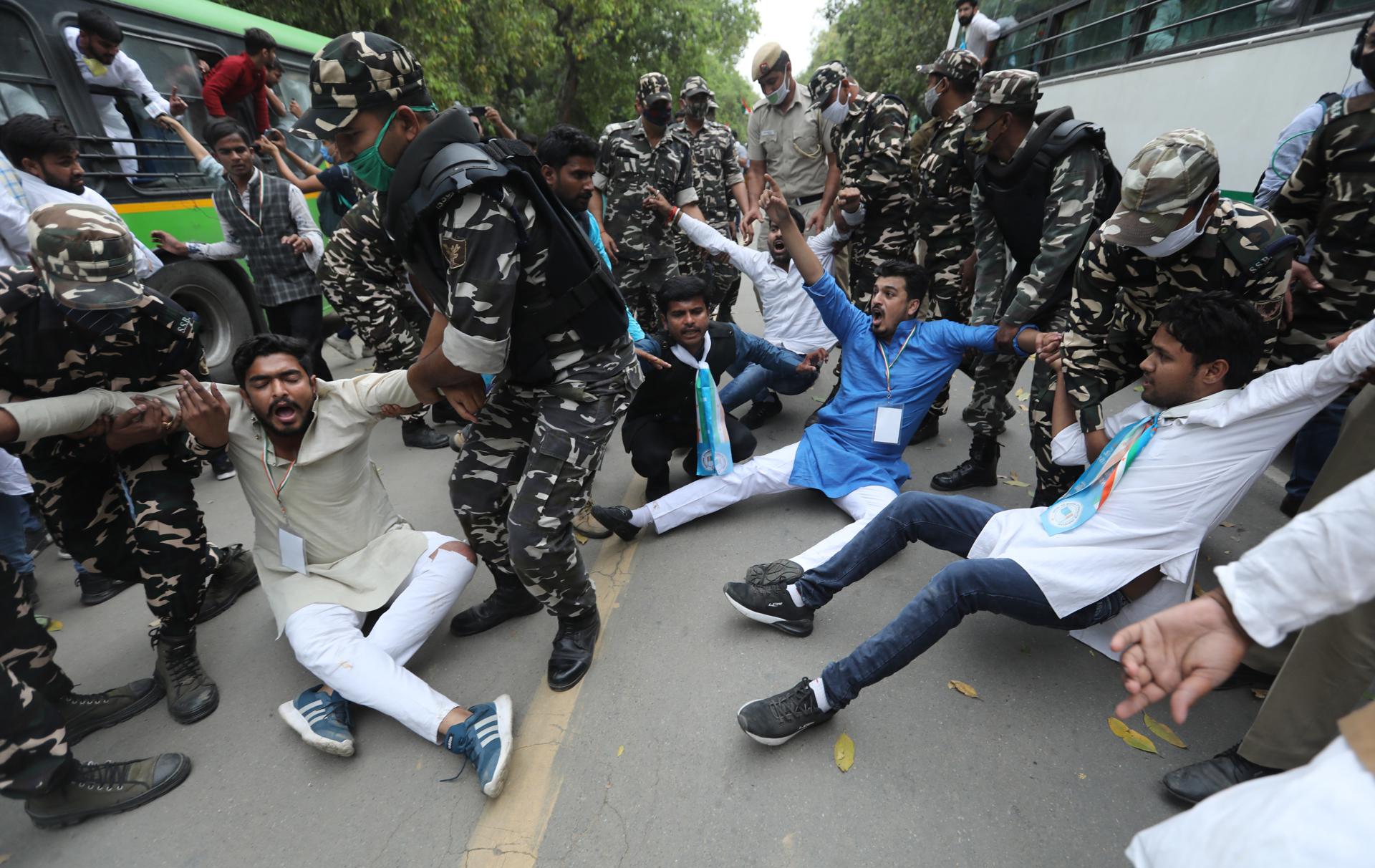 Indian police detain members of National Students' Union of India (NSUI) as they protest against the rise in unemployment and Central Government policies, in New Delhi, India, 12 March 2021. EFE/EPA/FILE/RAJAT GUPTA