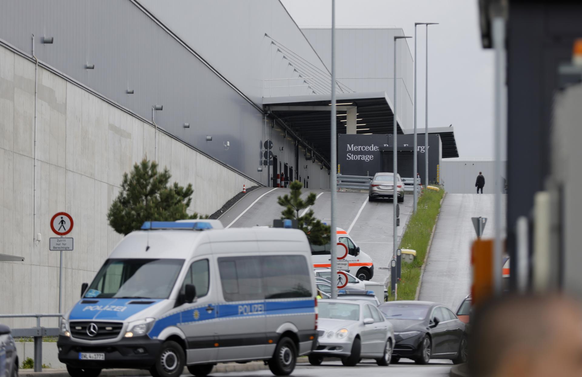 Police car parked in front of the Mercedes factory where a shooting took place in Sindelfingen, Germany, 11 May 2023. EFE/EPA/RONALD WITTEK
