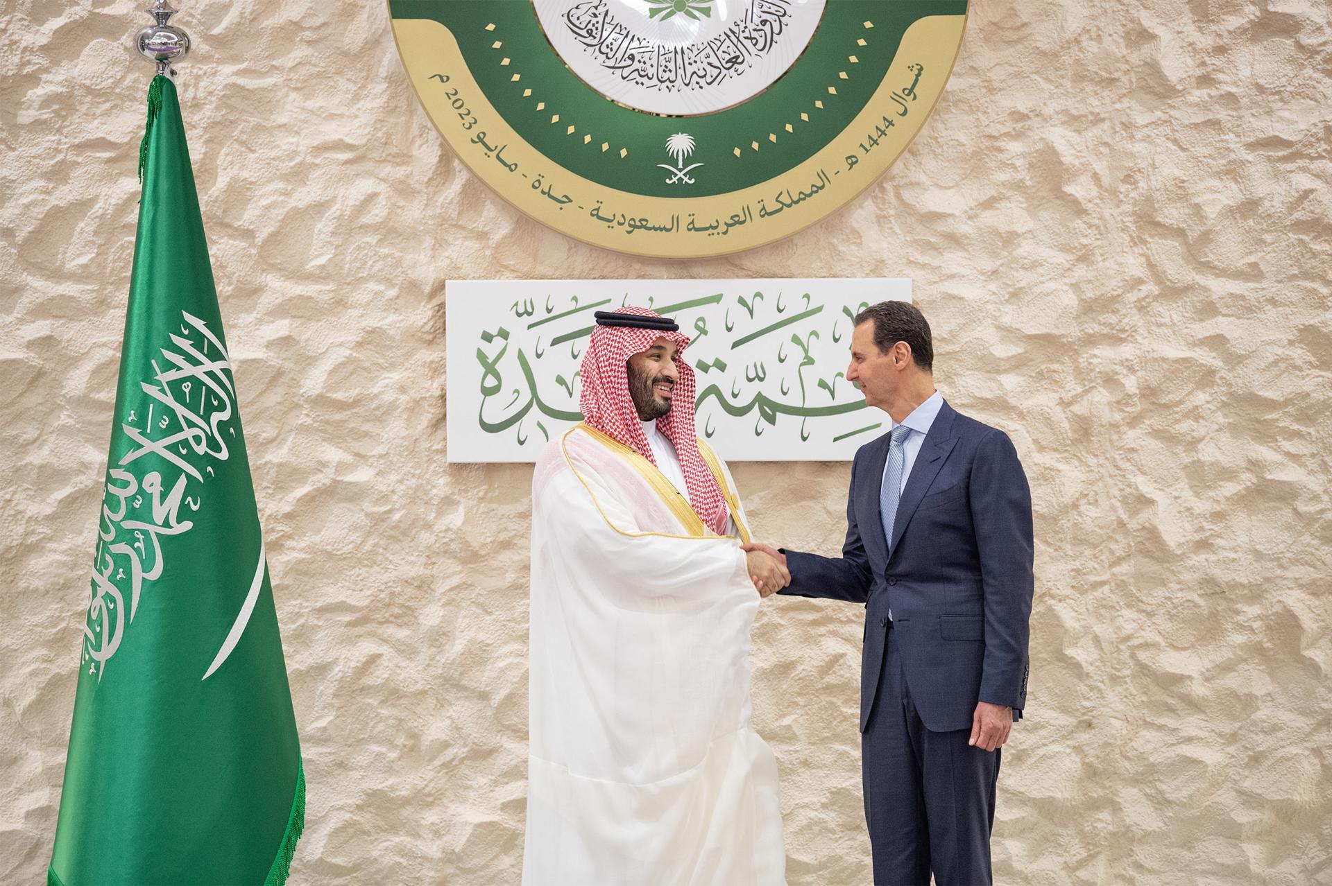 A handout photo made available by Saudi Royal Palace shows Saudi Crown Prince Mohammed bin Salman (L) receiving Syrian President Bashar al-Assad prior the 32nd Arab League summit, in Jeddah, Saudi Arabia, 19 May 2023. EFE/EPA/BANDAR ALJALOUD / HANDOUT HANDOUT EDITORIAL USE ONLY/NO SALES