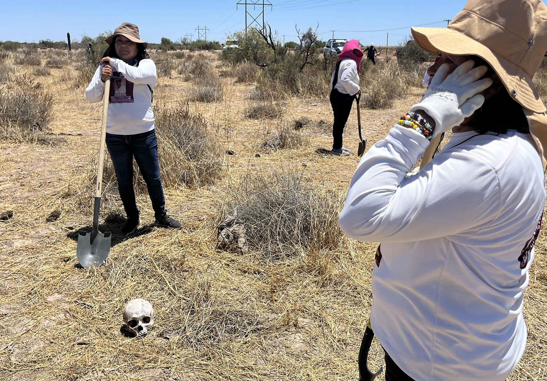 Women of the Searching Mothers collective in Sonora find human remains in a clandestine grave in Hermosillo, Mexico, on May 4, 2023. EFE/Daniel Sanchez