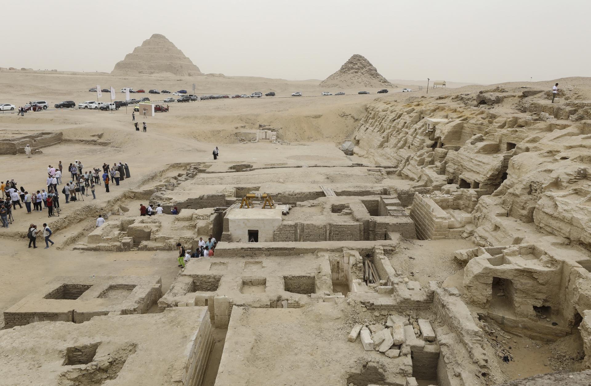 A general view shows people visiting the newly-discovered burial site in Saqqara, Giza Governorate, Egypt, 27 May 2023. EFE/EPA/KHALED ELFIQI