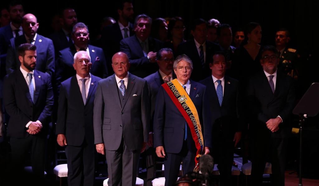 The President of Ecuador, Guillermo Lasso (c), arrives, together with the military leadership, to present his report to the Nation after the death cross that closed the National Assembly, today at the Government Platform, in Quito (Ecuador).  EFE/Jose Jacome