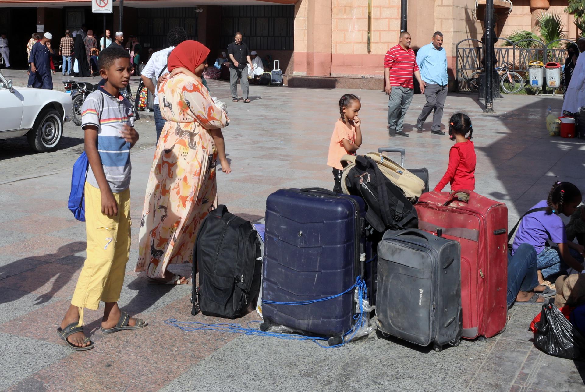 People who fled Sudan wait outside the railway station in Aswan, Egypt, 04 May 2023. EFE/EPA/KHALED ELFIQI