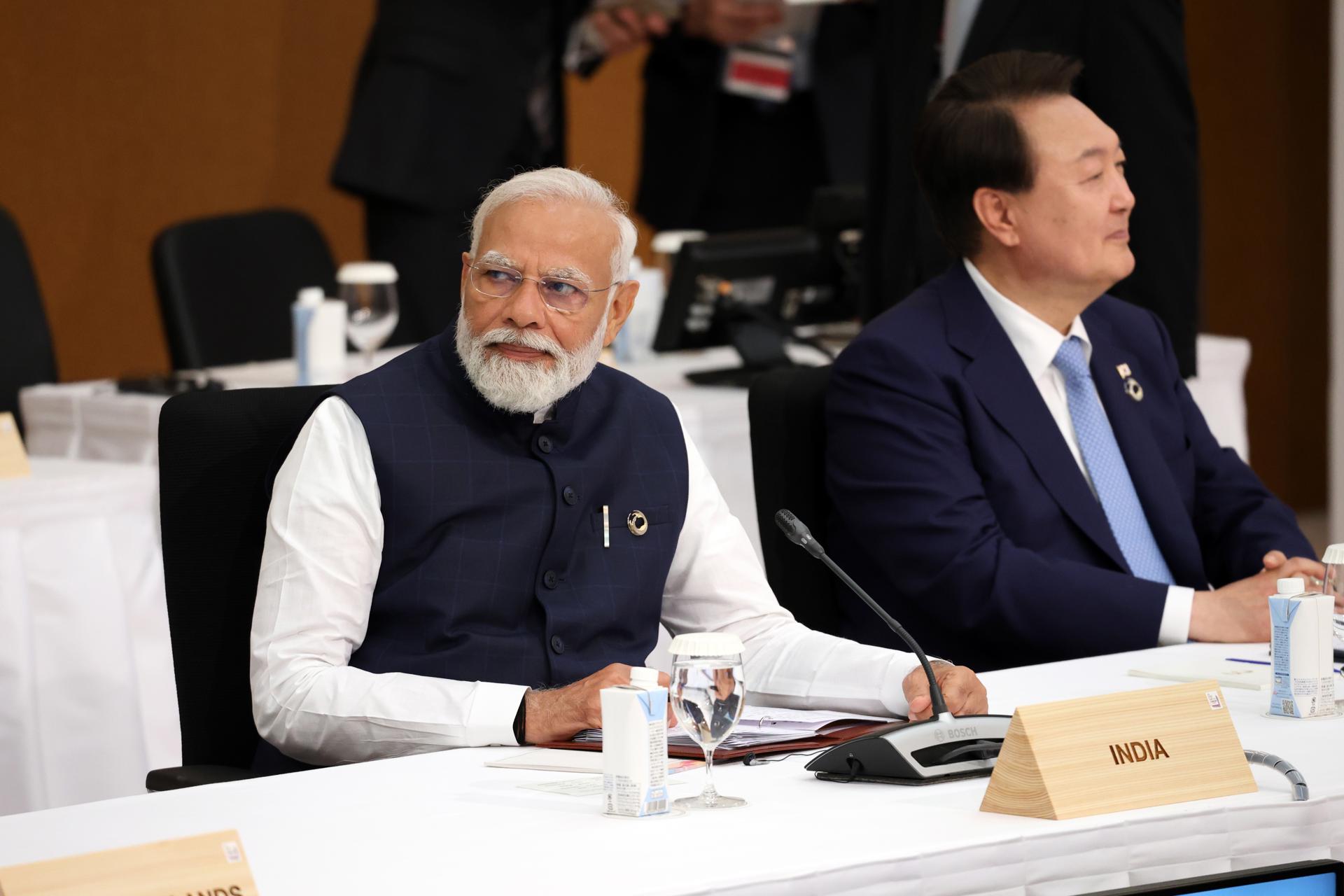 A handout photo made available by the G7 Hiroshima Summit Host shows Indian Prime Minister Narendra Modi (L) at the Grand Prince Hotel Hiroshima during the G7 Hiroshima Summit in Hiroshima, Japan, 20 May 2023. EFE-EPA FILE/G7 Hiroshima Summit Host / HANDOUT HANDOUT EDITORIAL USE ONLY/NO SALES