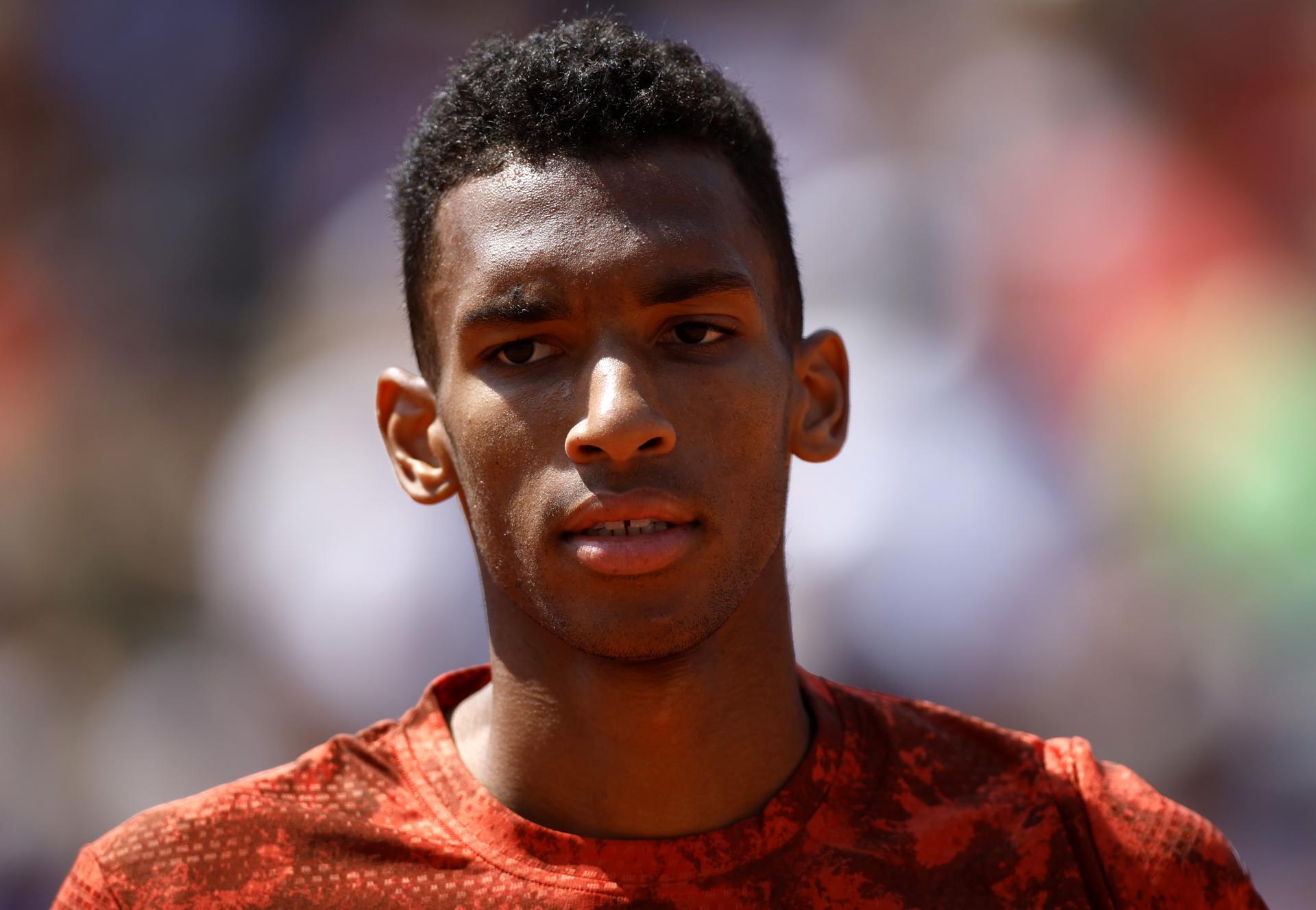 Felix Auger-Aliassime of Canada, the No. 10 seed, reacts during his match against Italy's Fabio Fognini in first-round action at the French Open on 29 May 2023 in Paris, France. Fognini scored a 6-4, 6-4, 6-3 upset. EFE/EPA/YOAN VALAT
