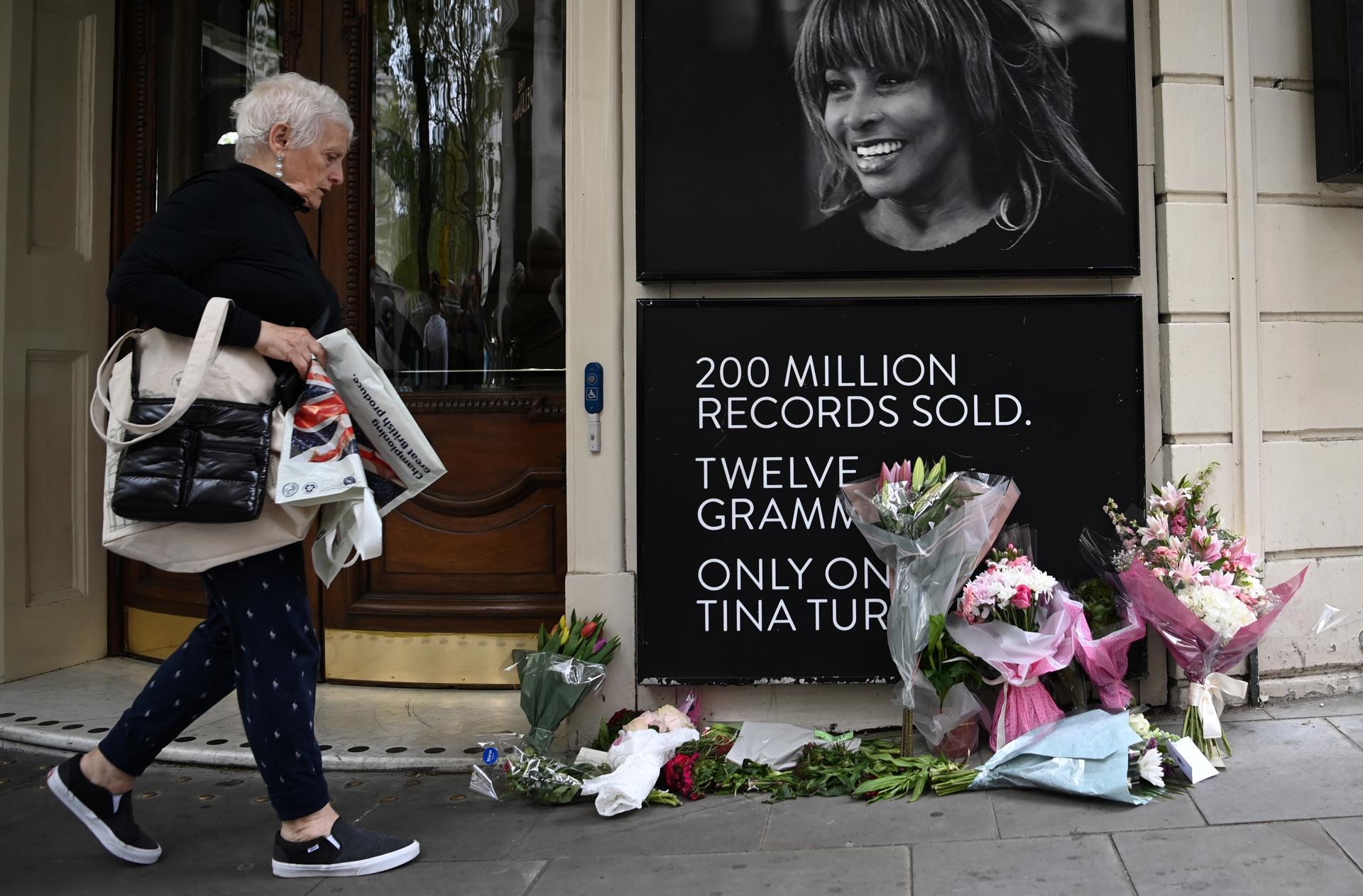 Floral tributes to late US singer Tina Turner lay outside 'Tina The Musical' at the Aldwych Theatre following the death of Tina Turner in London, Britain, 25 May 2023. EFE-EPA/ANDY RAIN