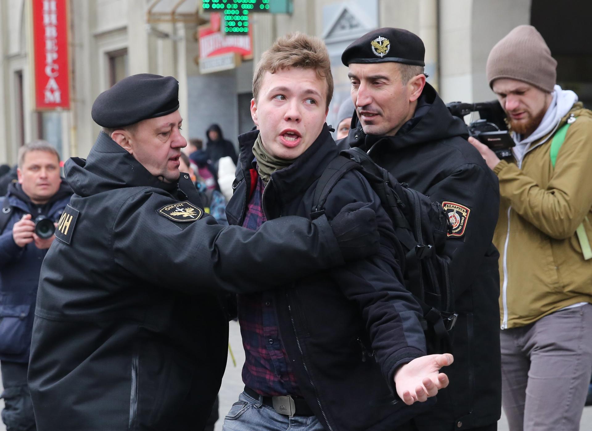 (FILE) Police officers detain a journalist attempting to cover a rally in Minsk, Belarus, 26 March 2017.  EFE/EPA/TATYANA ZENKOVICH