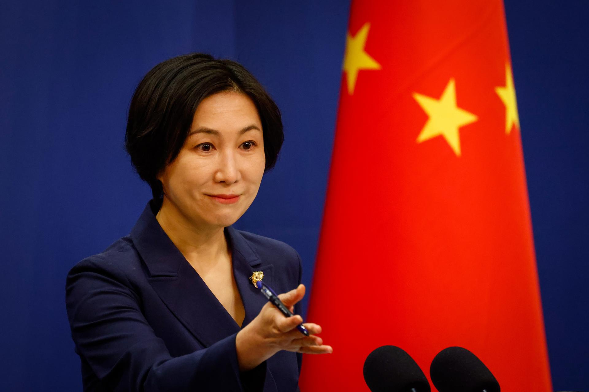 China's Foreign Ministry spokesperson Mao Ning gestures to a reporter during a press conference at the Ministry of Foreign Affairs in Beijing, China, 24 March 2023. EFE-EPA/MARK R. CRISTINO/FILE