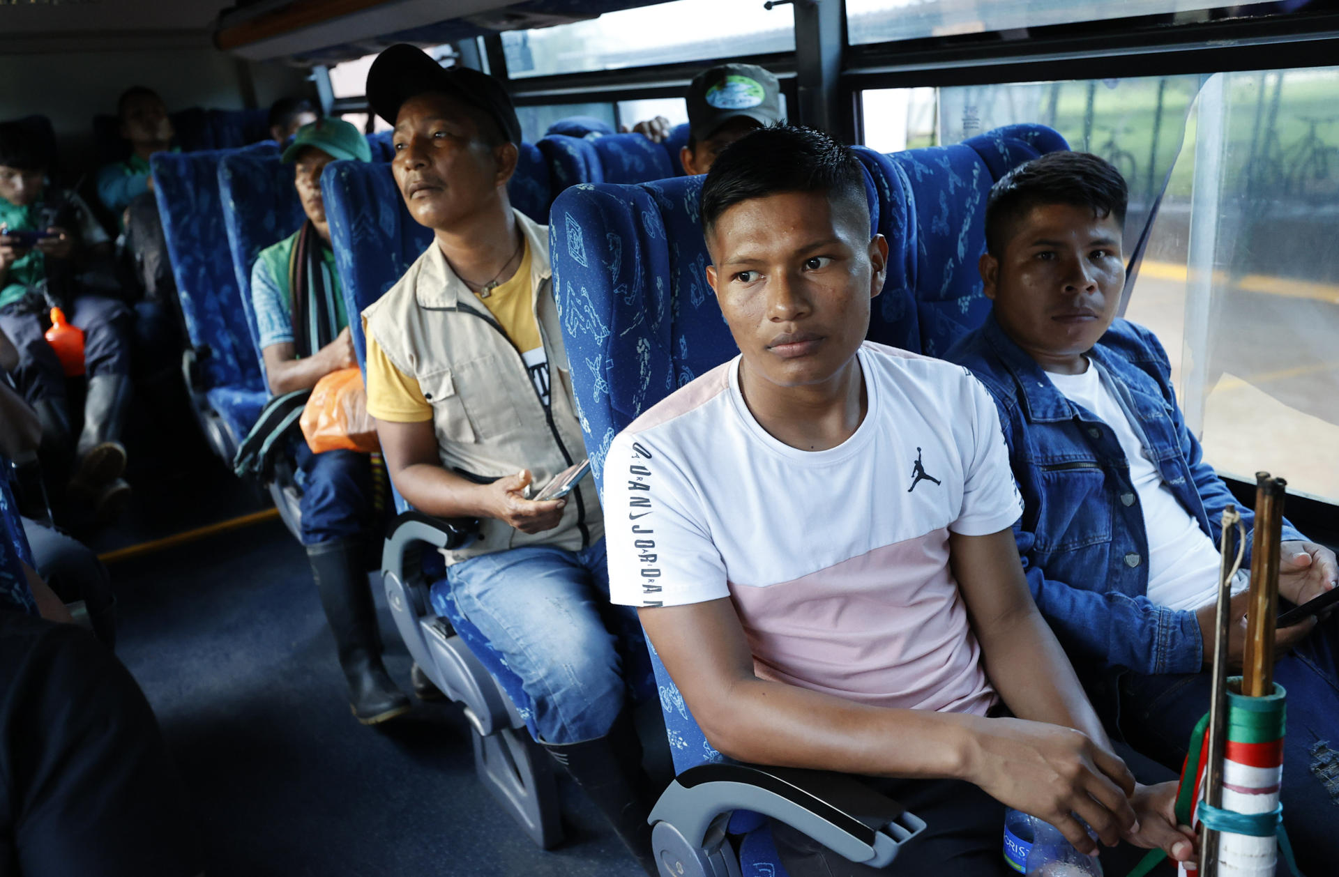 Indigenous volunteers ride in a bus on May 21, 2022, before beginning their search for four children missing after a plane crash in southern Columbia.  EFE/ Mauricio Dueñas Castañeda
