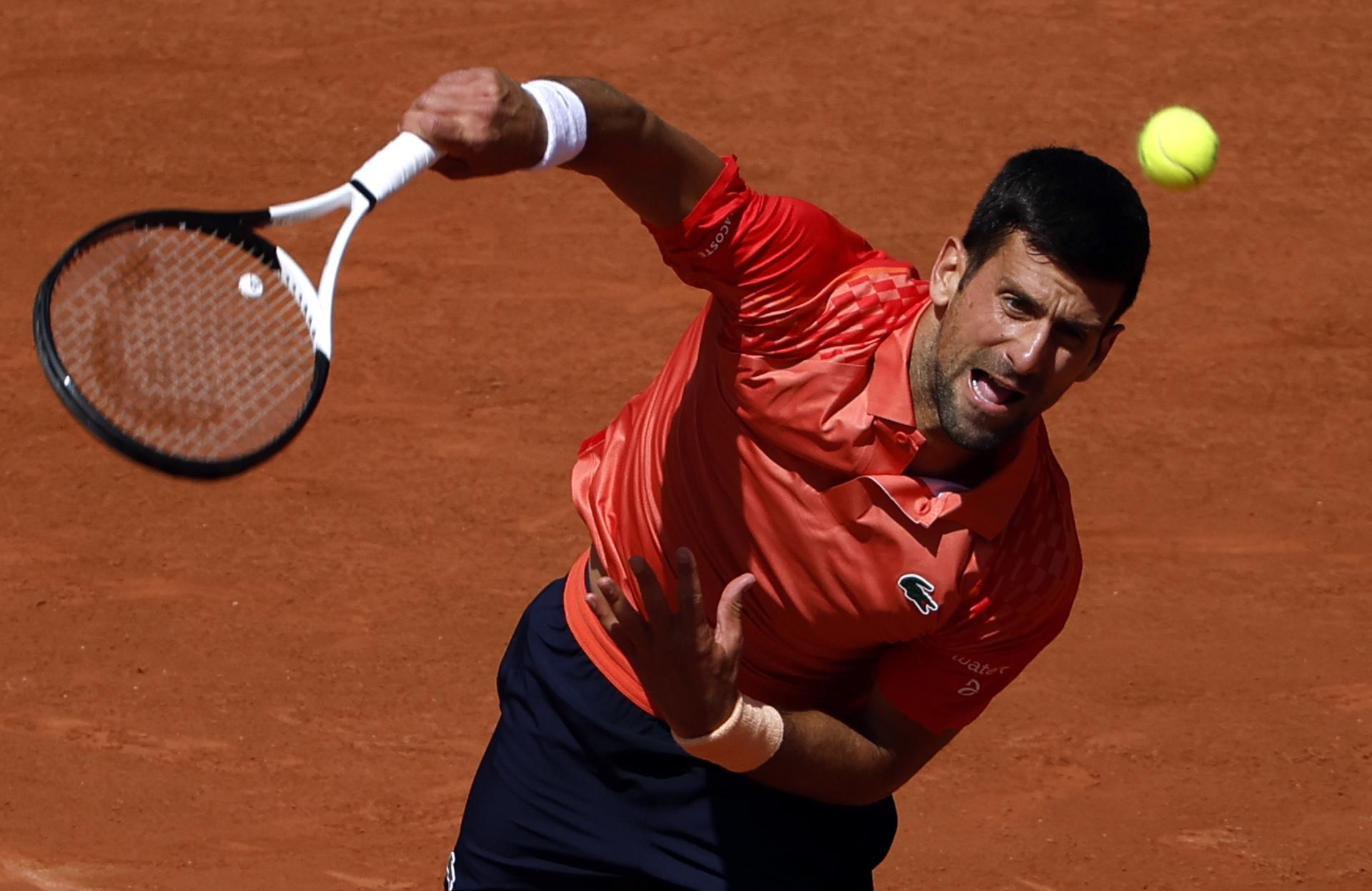 Serbian great Novak Djokovic hits a serve during his French Open first-round match against Aleksandar Kovacevic of the United States on 29 May 2023 in Paris, France. Djokovic won 6-3, 6-2, 7-6 (7-1). EFE/EPA/YOAN VALAT
