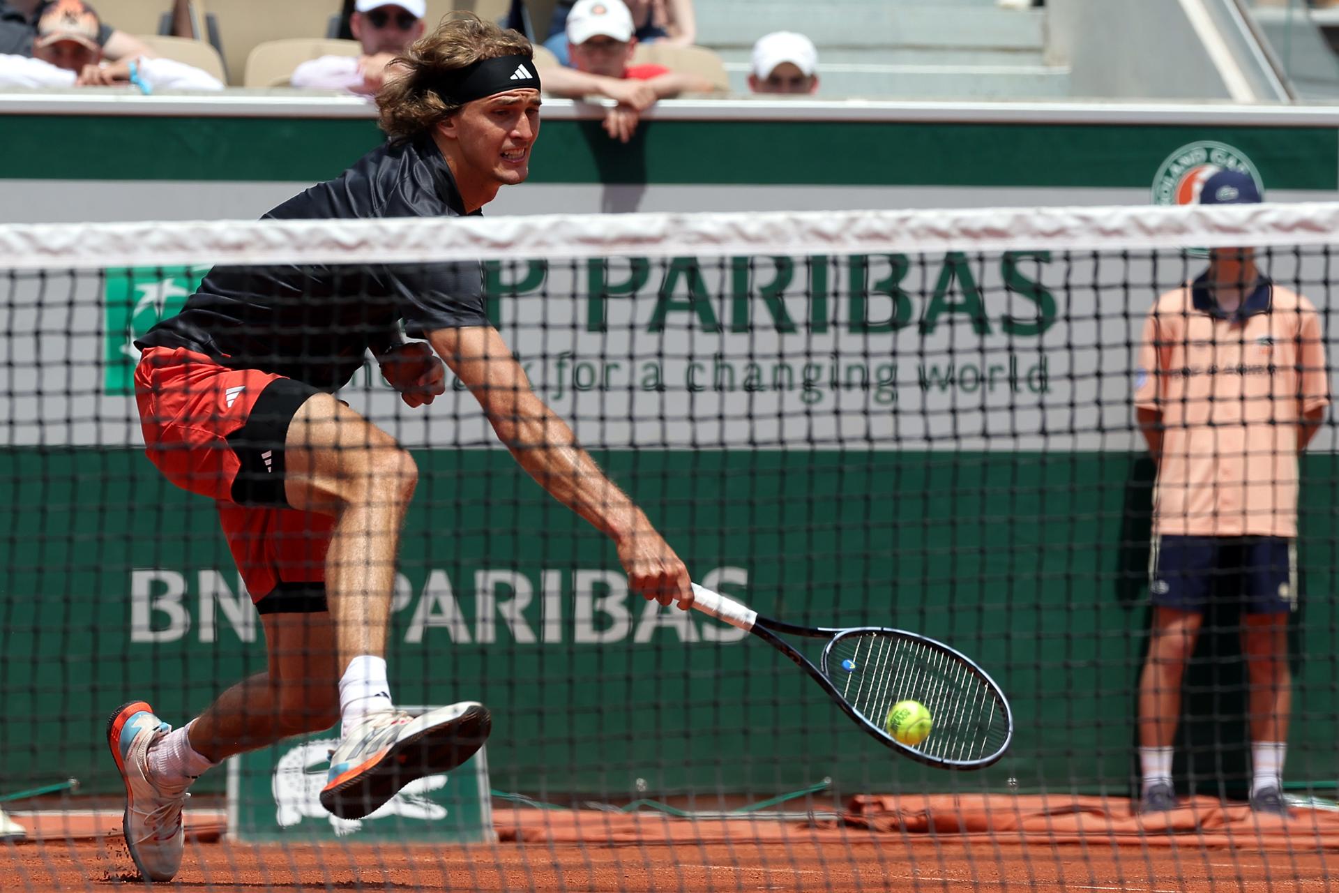 Alexander Zverev of Germany retrieves a drop shot during his French Open first-round match against Lloyd Harris of South Africa on 30 May 2023 in Paris, France. Zverev won 7-6 (7-5), 7-6 (7-0), 6-1. EFE/EPA/TERESA SUAREZ

