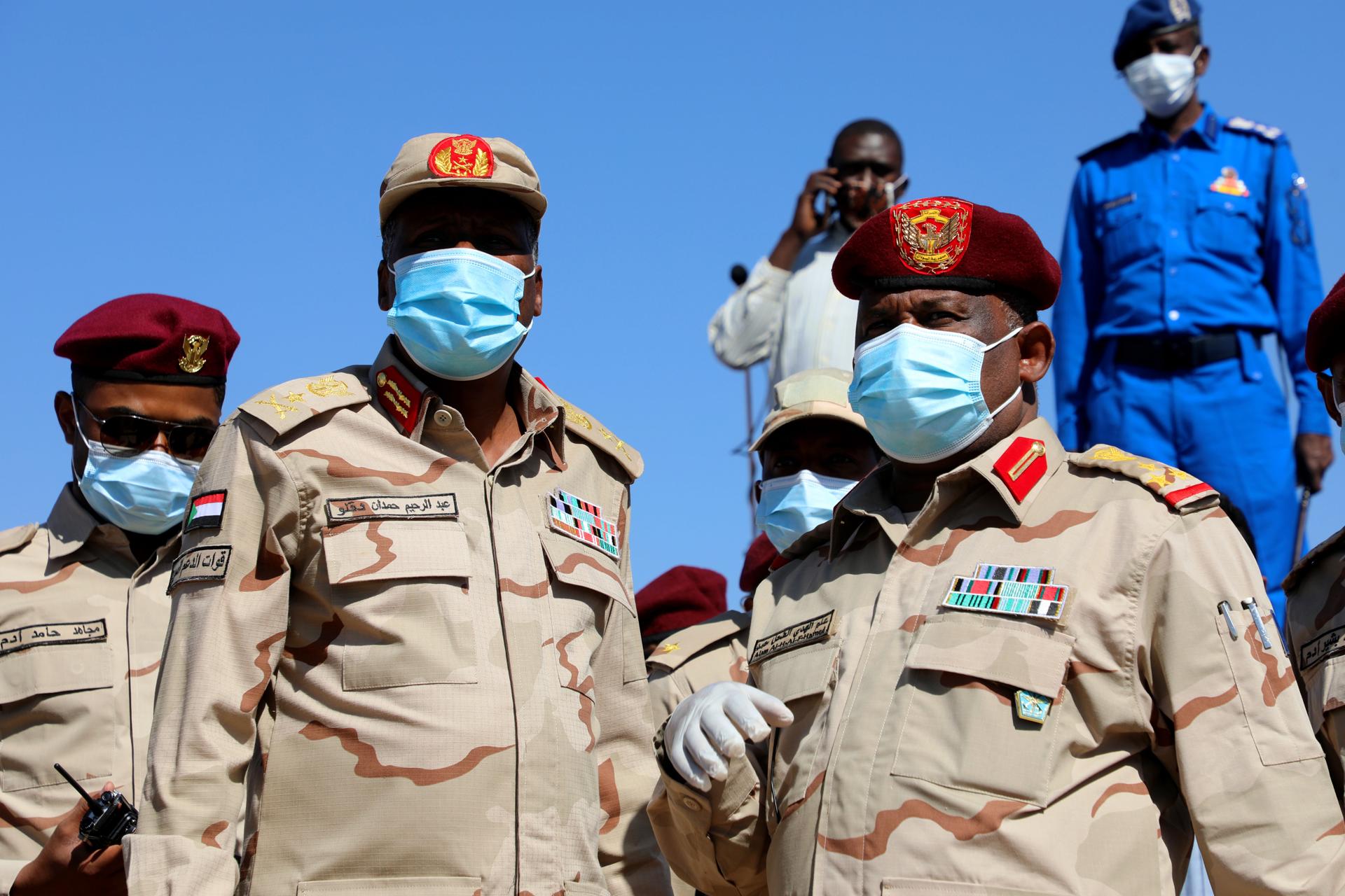 Abd al-Rahim Hamdan Dogolo (L), Second Commander of the Rapid Support Forces, Brigadier General Alam al-Huda Hamid (R), representative of the Rapid Support Operations Room, during the arrangements for the start of the celebration for the reception of peace leaders, as organized by the transitional government, in Khartoum, Sudan, 15 November 2020. EFE-EPA/MOHAMMED ABU OBAID/FILE