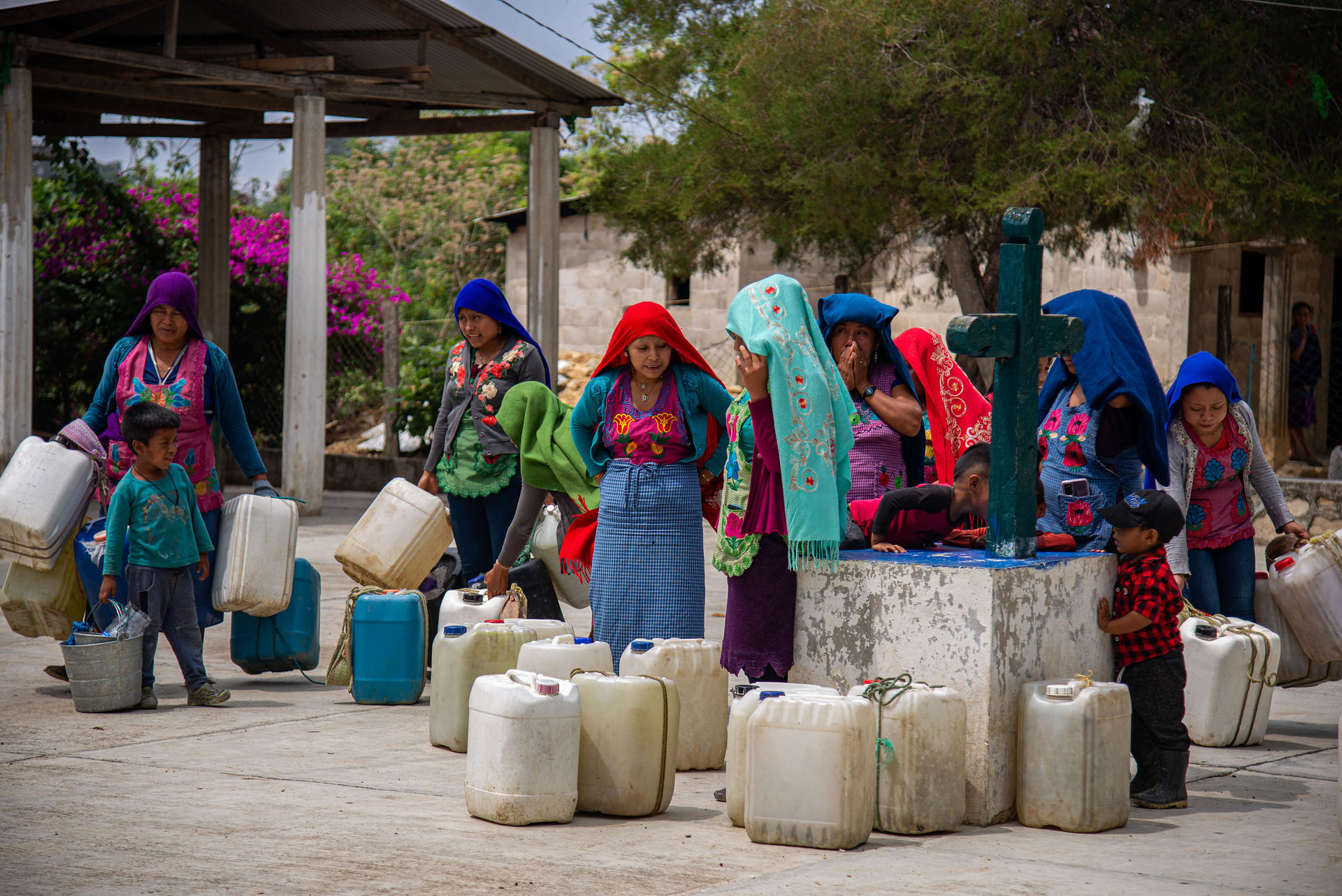Tzotzil Maya residents of the community of Guadalupe Xu’kun, located in the southeastern Mexican state of Chiapas, fill containers with water on 22 June 2023 in the nearby town of Zinacantan. EFE/Carlos Lopez
