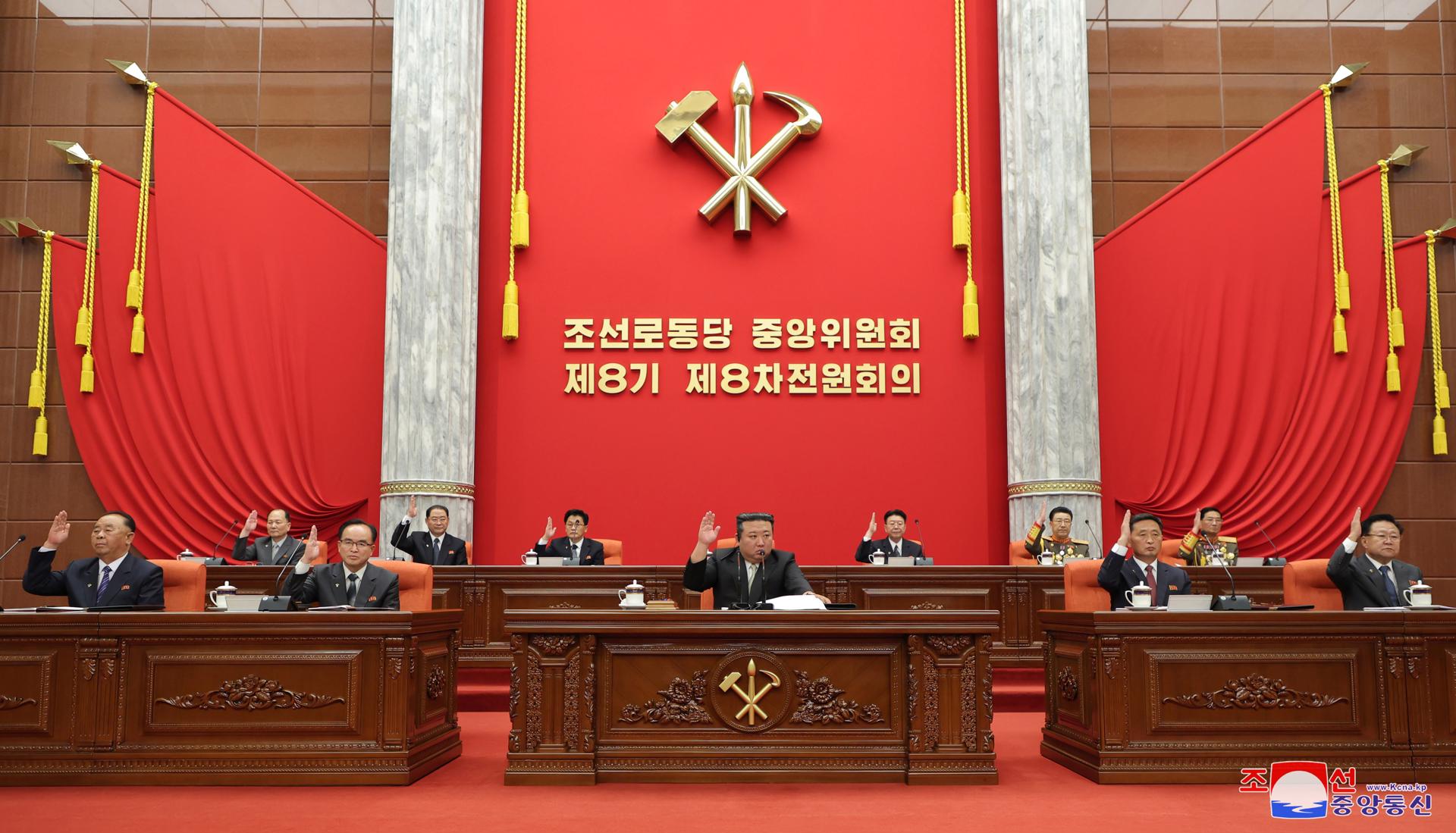 An undated photo released by the official North Korean Central News Agency (KCNA) shows North Korea leader Kim Jong Un (front C) raising his hand with other officials while attending an enlarged plenary meeting of 8th Workers' Party of Korea Central Committee at the office building of the WPK Central Committee in Pyongyang, North Korea (issued 19 June 2023). EFE-EPA/KCNA EDITORIAL USE ONLY