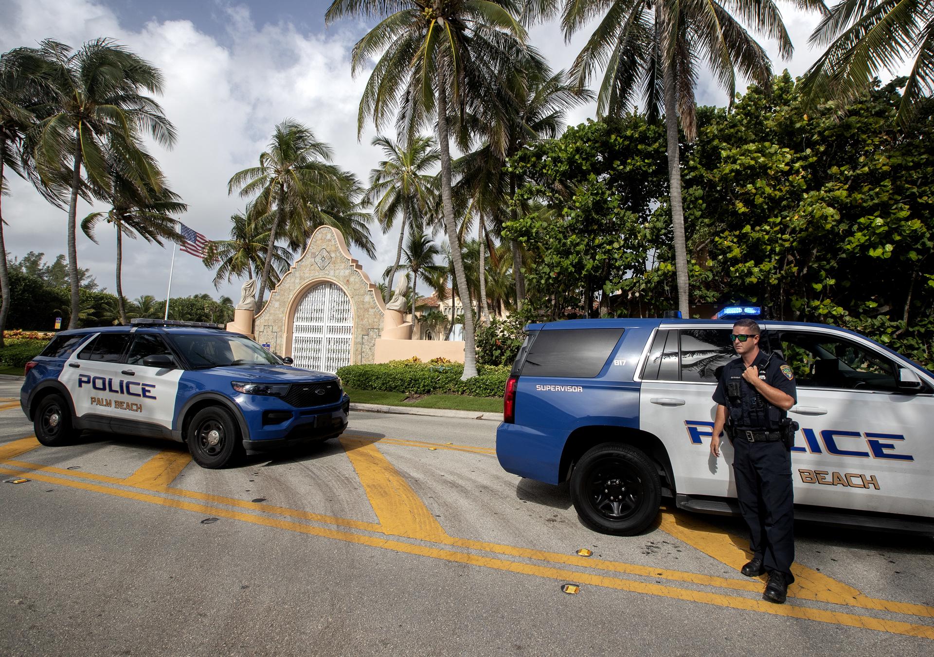 Authorities stand outside Mar-a-Lago, the residence of former president Donald Trump, amid reports of the FBI executing a search warrant as a part of a document investigation, in Palm Beach, Florida, USA, 09 August 2022. EFE-EPA FILE/CRISTOBAL HERRERA-ULASHKEVICH
