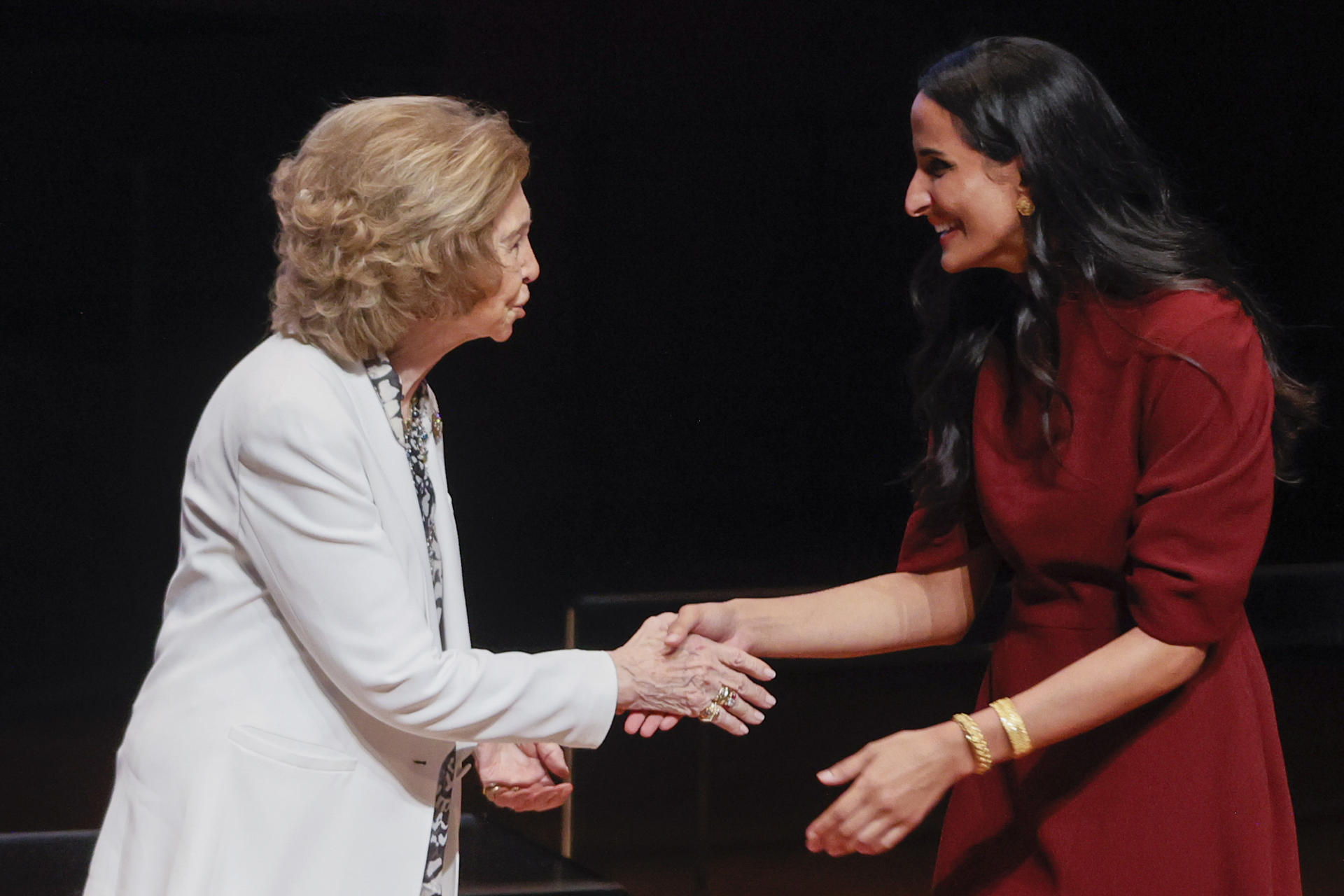 Spain's Queen Sofía (L) greets the vice president and CEO of the Qatar Foundation, Sheikha Hind bint Hamad Al Thani (R), during the closing ceremony and concert of the 2022-2023 academic year of the Reina Sofía School of Music at the Museo Nacional Centro de Arte Reina Sofía in Madrid, Spain, 20 June 2023. EFE/ Mariscal