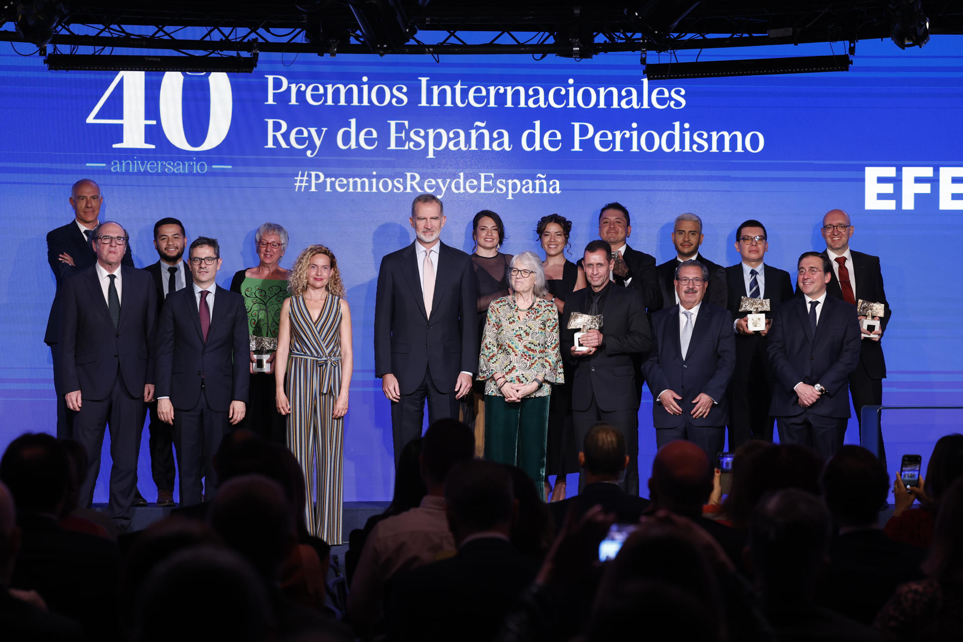 Spain's Felipe VI (c); the president of Agencia EFE, Gabriela Cañas (c-r); and assorted officials pose at the annual King of Spain International Journalism Awards, in Madrid on June 15, 2023. EFE/ Juanjo Martin