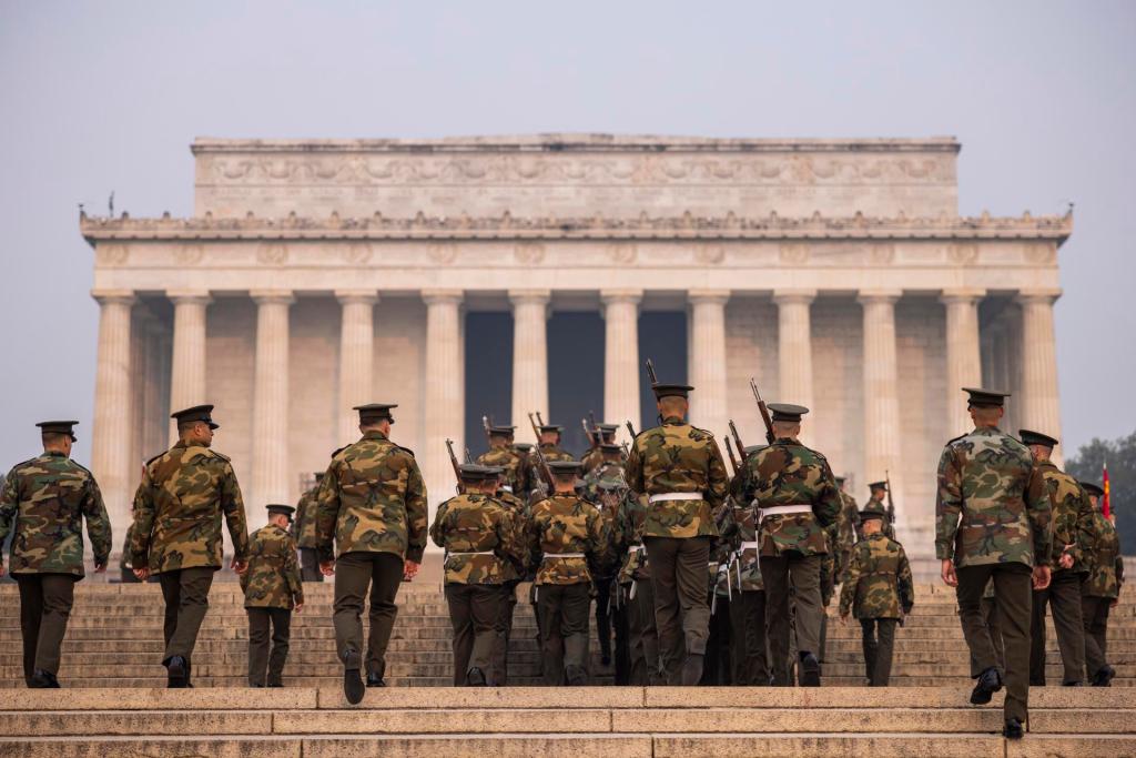 Members of the Marine Corps practice for an upcoming parade under a cloudy sky due to the Canadian forest fires near the Lincoln Memorial in Washington, this June 8, 2023. EFE/EPA/Jim Lo Scalzo