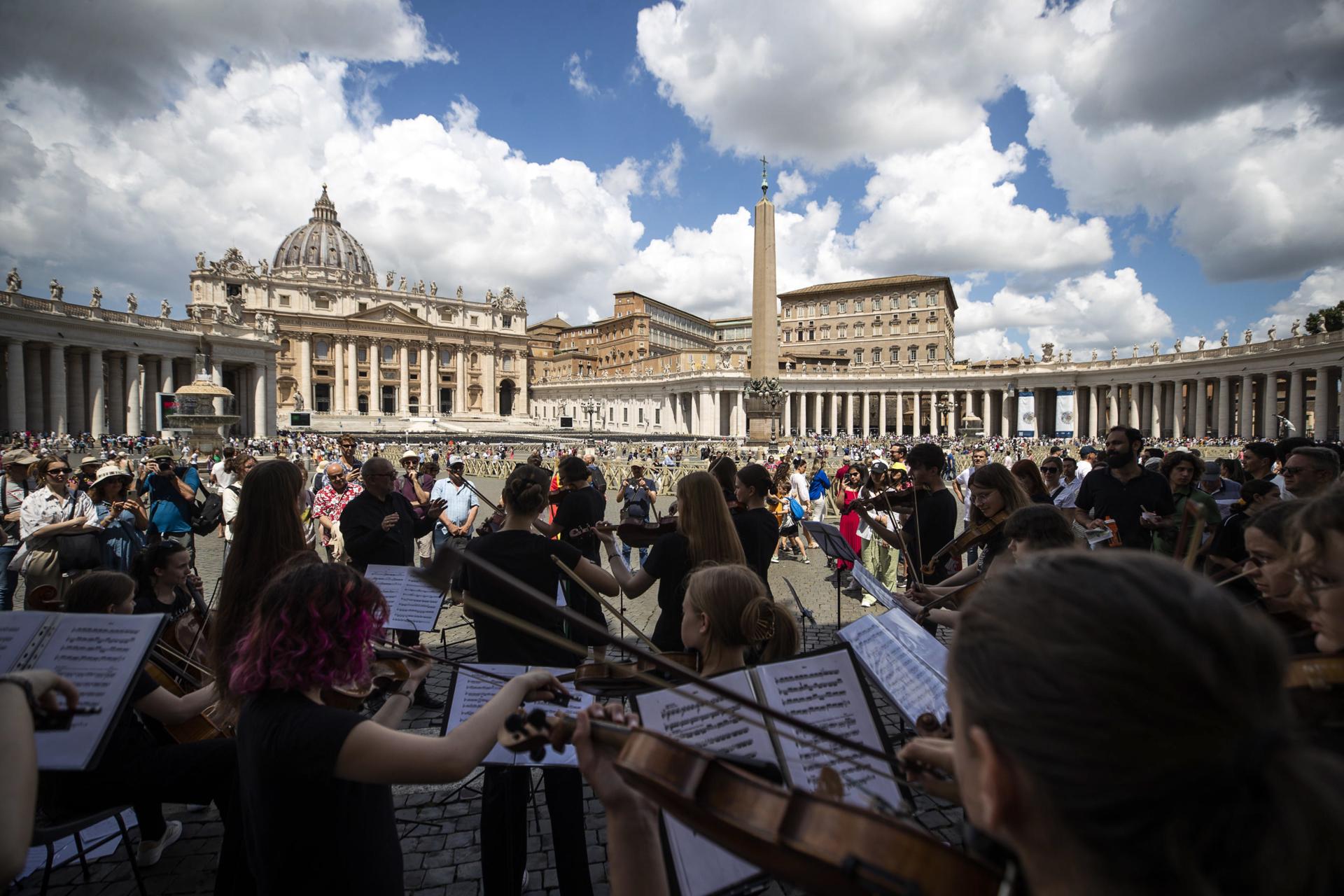Members of a German folk band gather for the Angelus prayer in Saint Peter's square, that Pope Francis celebrated privately at the Agostino Gemelli University Hospital where he was hospitalized, Vatican City, 11 June 2023. EFE/EPA/ANGELO CARCONI