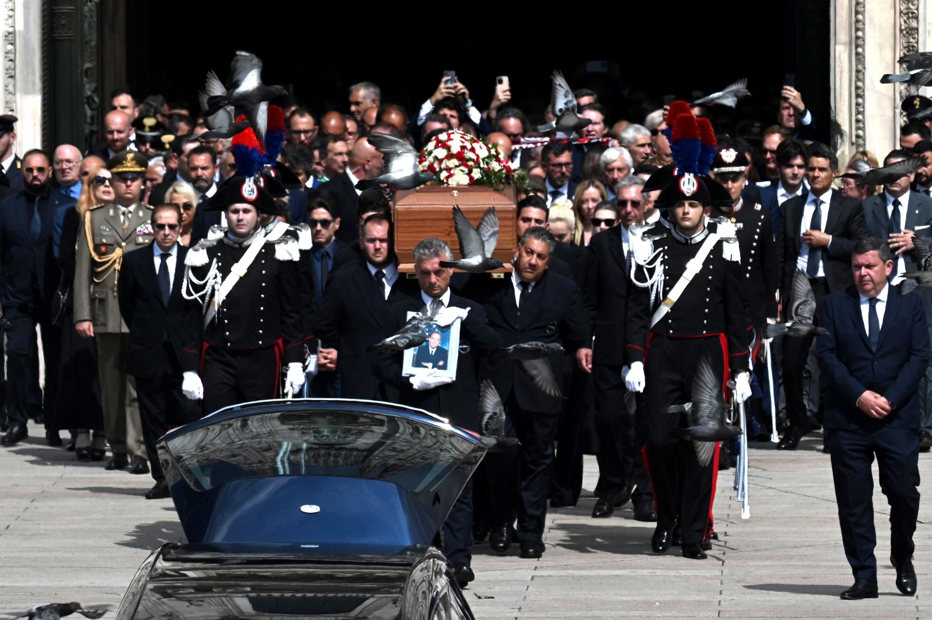 The casket of Italian politician and billionaire media magnate Silvio Berlusconi leaves the Milan Cathedral after the state funeral service on June 14, 2023. EFE/EPA/CIRO FUSCO
