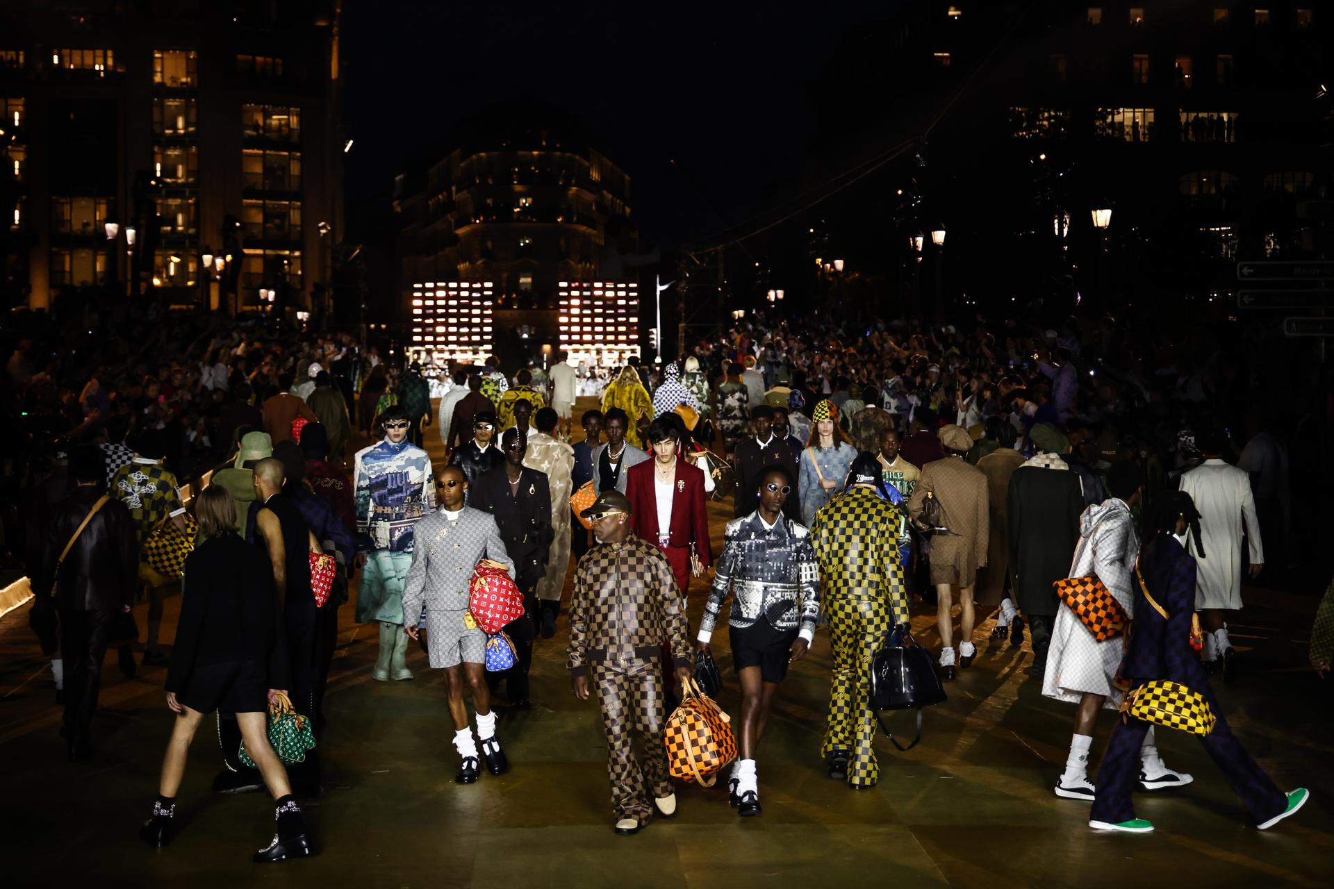 Models present creations from the Spring/Summer 2024 Men's collection by American designer Pharrell Williams for Louis Vuitton during the Paris Fashion Week, on the Pont Neuf bridge, in Paris, France, 20 June 2023. EFE/EPA/Mohammed Badra
