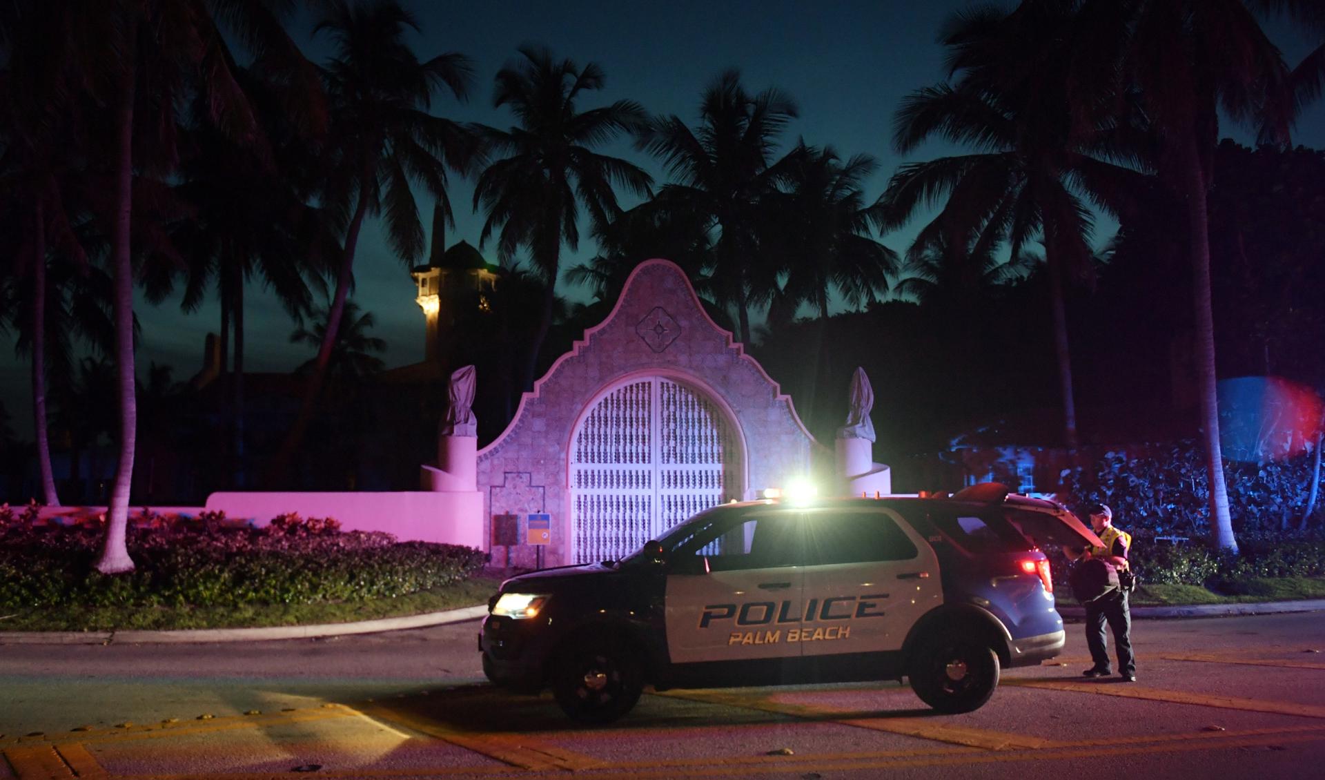 Authorities stand outside Mar-a-Lago, the residence of former president Donald Trump, amid reports of the FBI executing a search warrant as a part of a document investigation, in Palm Beach, Florida, USA, 08 August 2022. EFE-EPA FILE/JIM RASSOL
