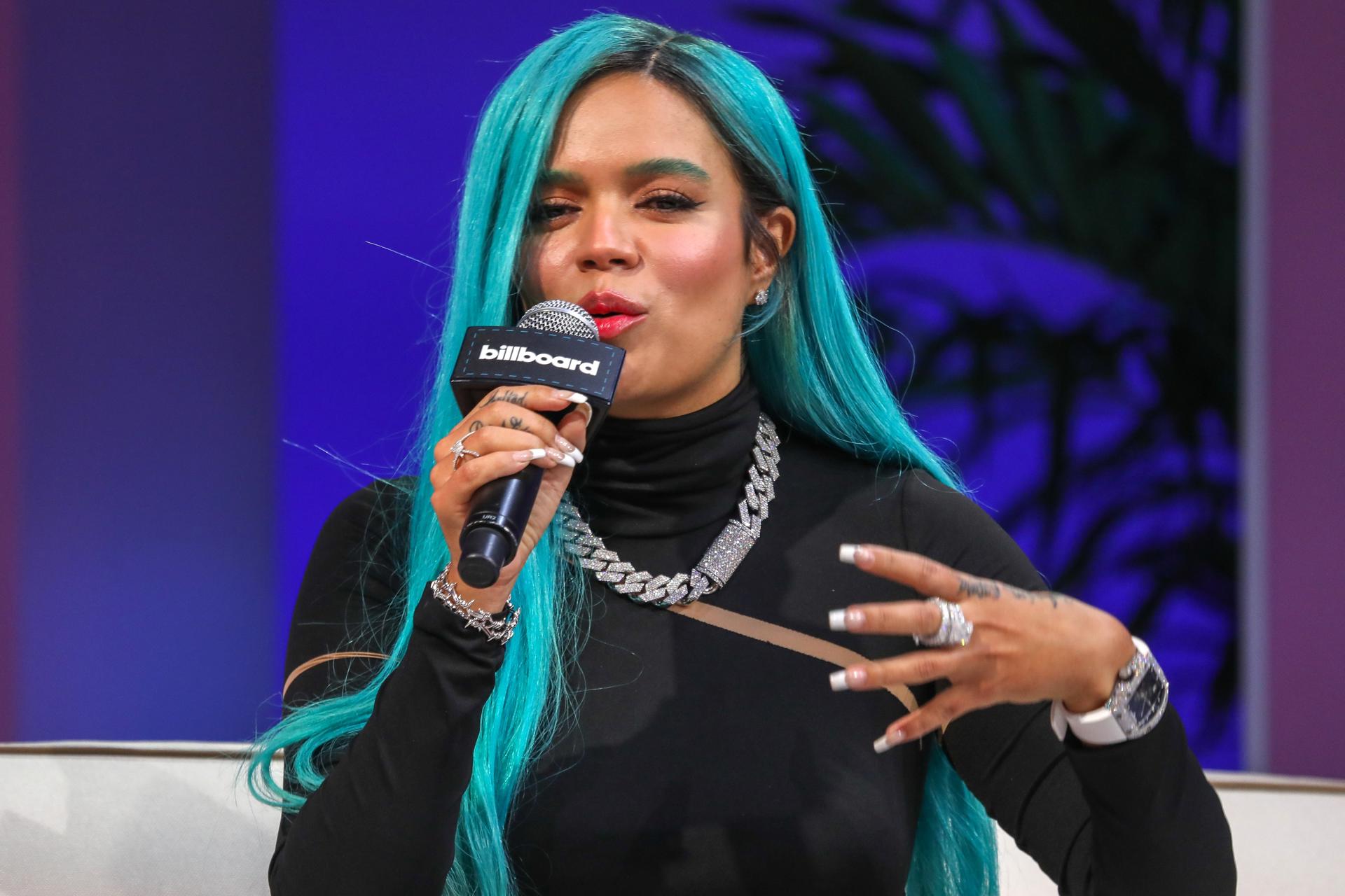 In this undated photo, Colombian singer Karol G speaks during a panel at the Latin Billboard Awards Conference at the Faena Fourm in Miami, Beach, Florida. EFE/Giorgio Viera