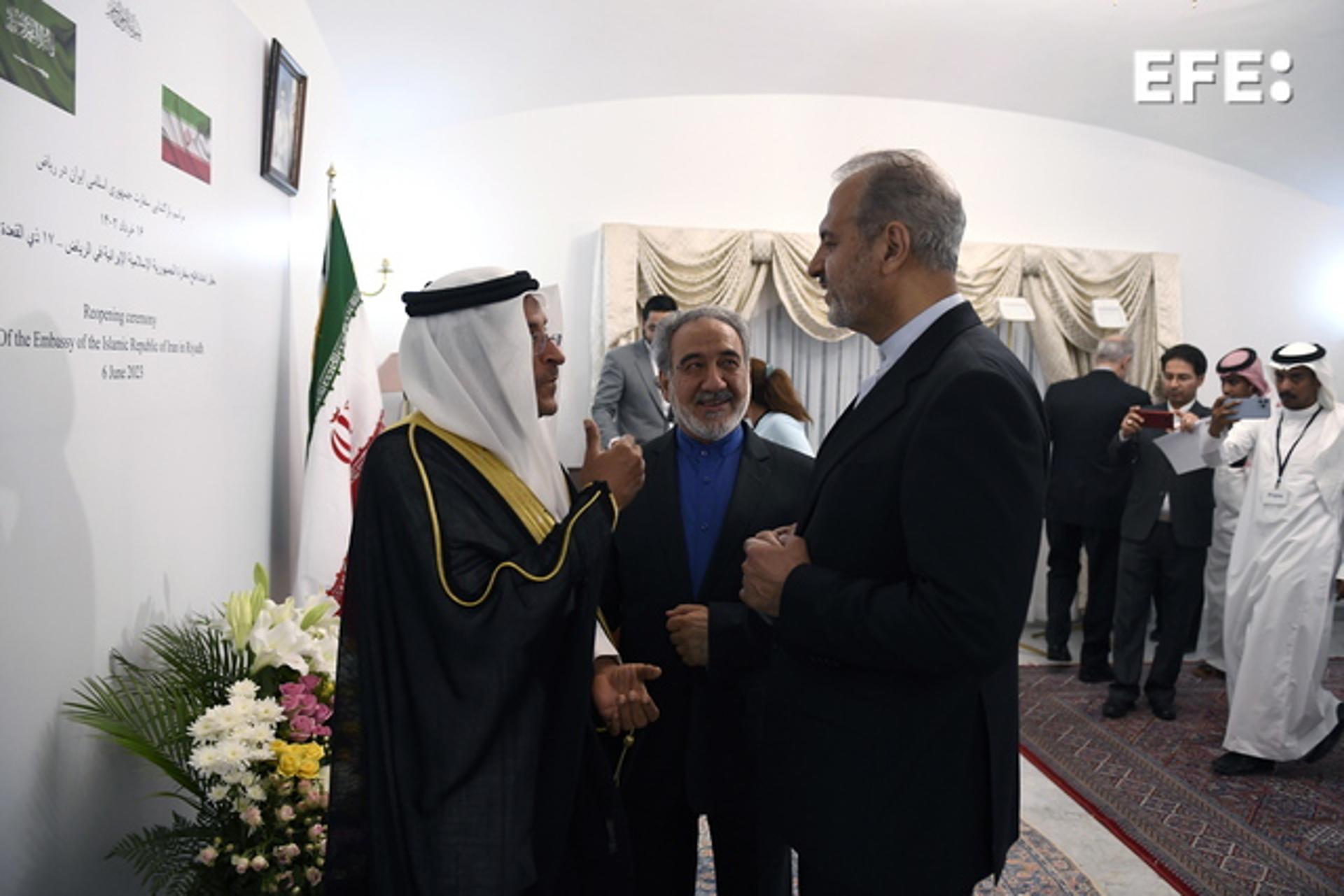 Iranian Deputy Foreign Minister Alireza Bigdeli (R) and diplomat Hassan Zarnegar Abarghoui (C) chat with the director of consular affairs at the Saudi foreign ministry, Ali Al-Youssef (L) during the ceremonial reopening of Iran's embassy in Riyadh on 6 June 2023. EFE/EPA/YAZEED ALDHAWAIHI

