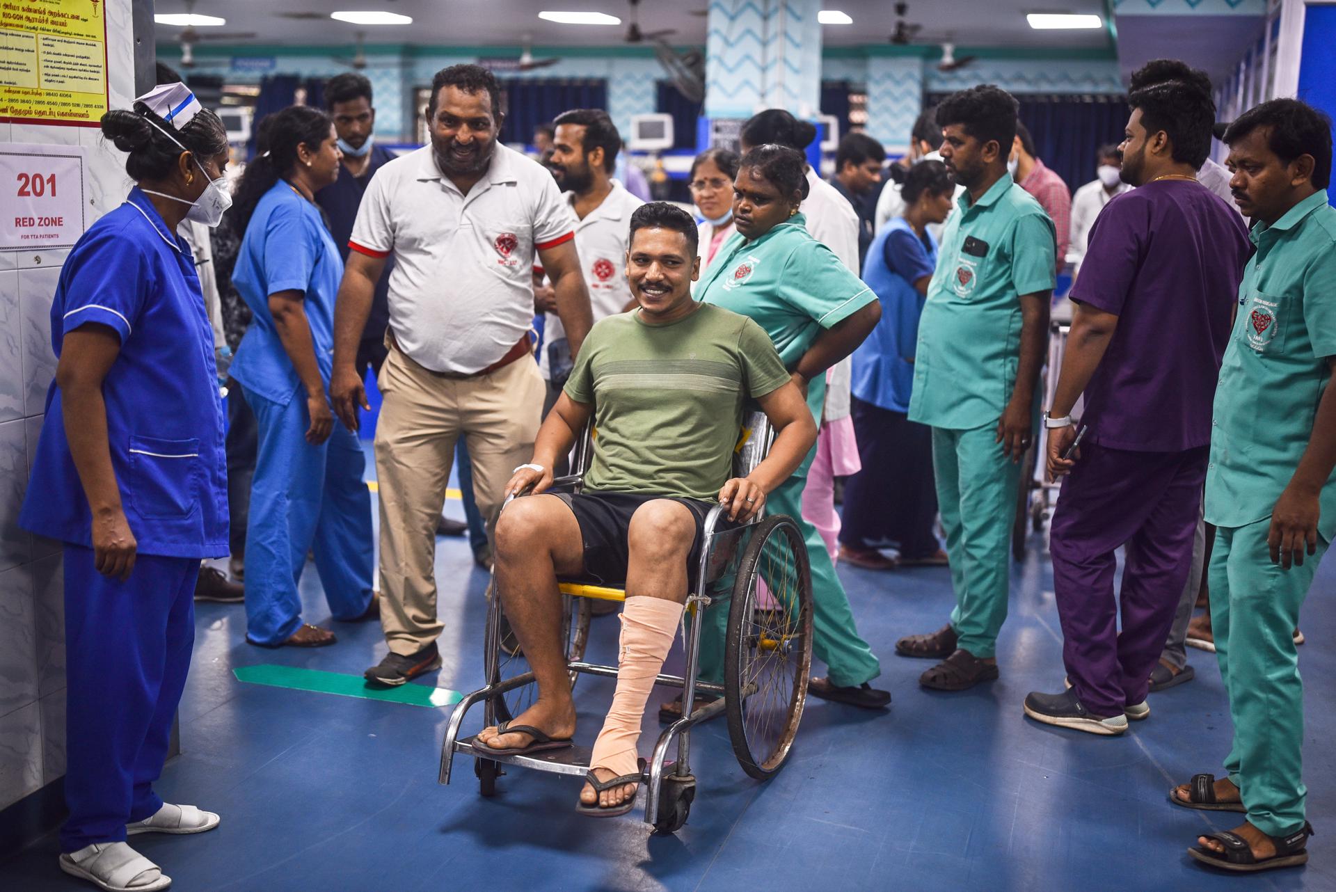 An injured passenger, who was affected by the triple train accident in Odisha, leaves after receiving medical care upon arrival on a special train, at Rajiv Gandhi government hospital, in Chennai, India, 04 June 2023. EFE-EPA/IDREES MOHAMMED
