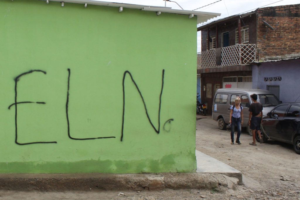 File photograph showing walls painted with signs alluding to the guerrilla group Ejército de Liberación Nacional (ELN).  EFE / Mario Caicedo