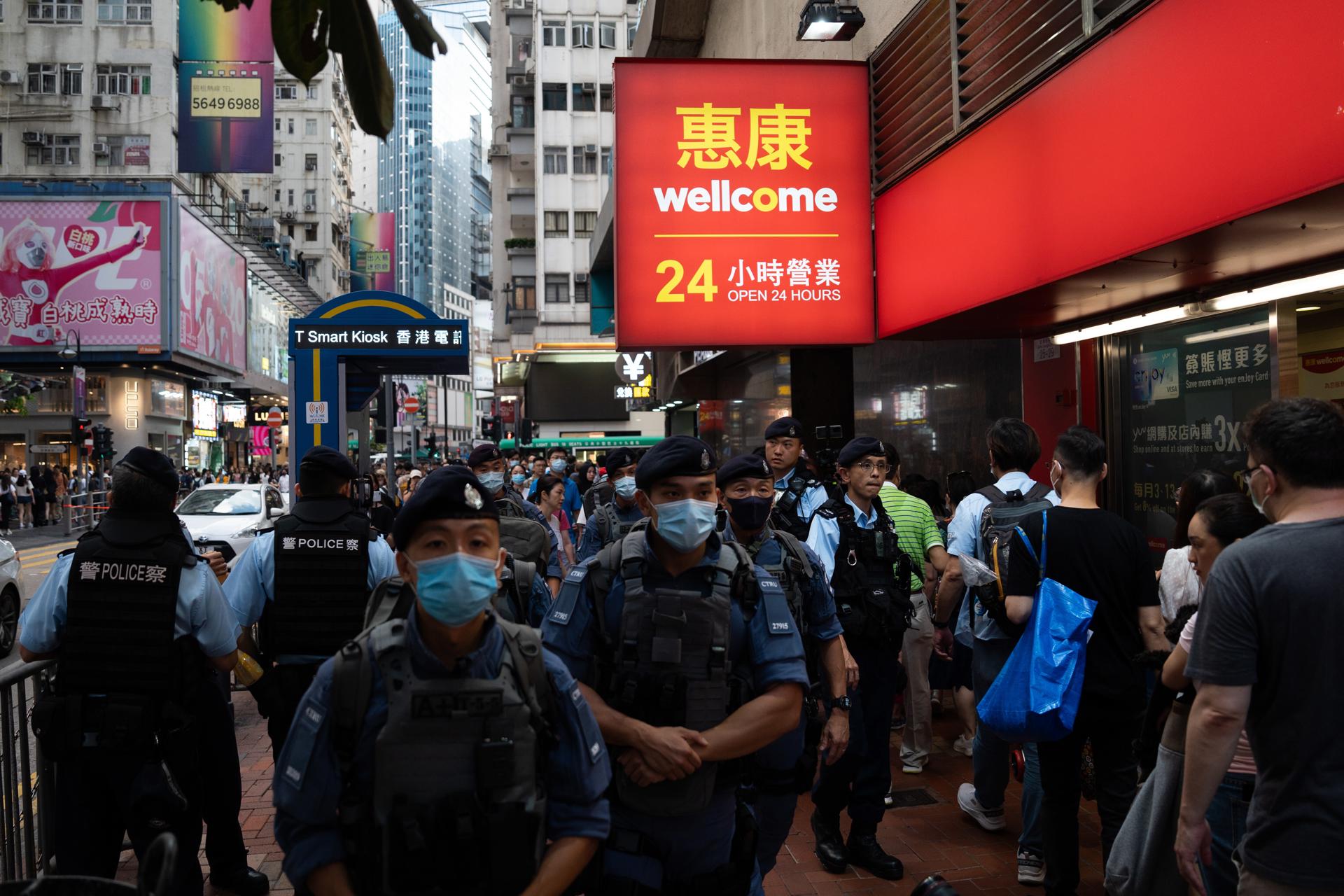 Police patrol in a shopping area near Victoria Park in Hong Kong, China, 04 June 2023. EFE-EPA FILE/BERTHA WANG