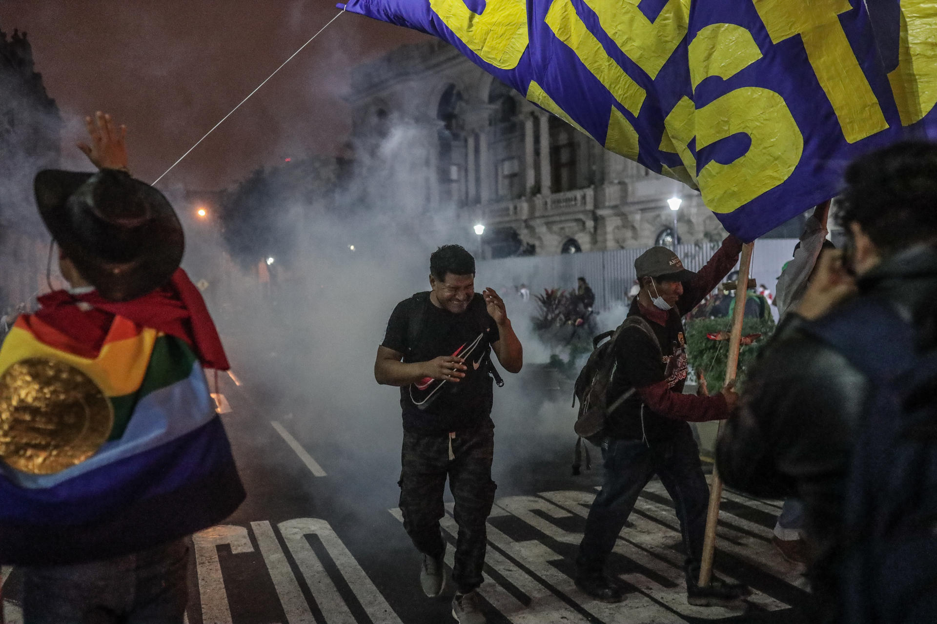 Anti-government demonstrators concentrated in the San Martín square run during clashes with the Police in a protest, in Lima, Peru, 22 July 2023. EFE-EPA/Aldair Mejia
