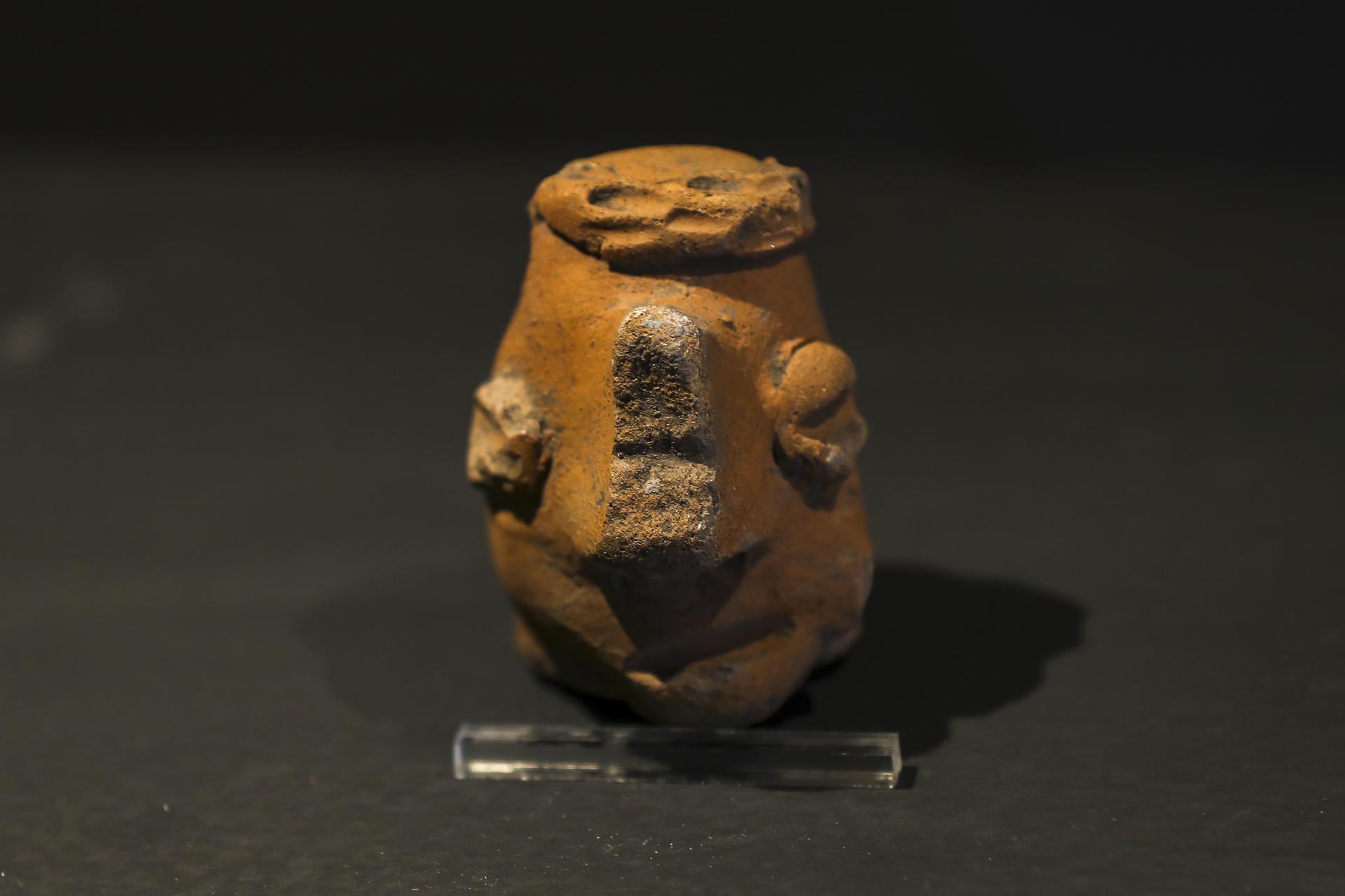 A 13 June 2023 photo of vessels and stone-carved objects at Ecuador's Archaeological Museum of Quito. EFE/José Jacome
